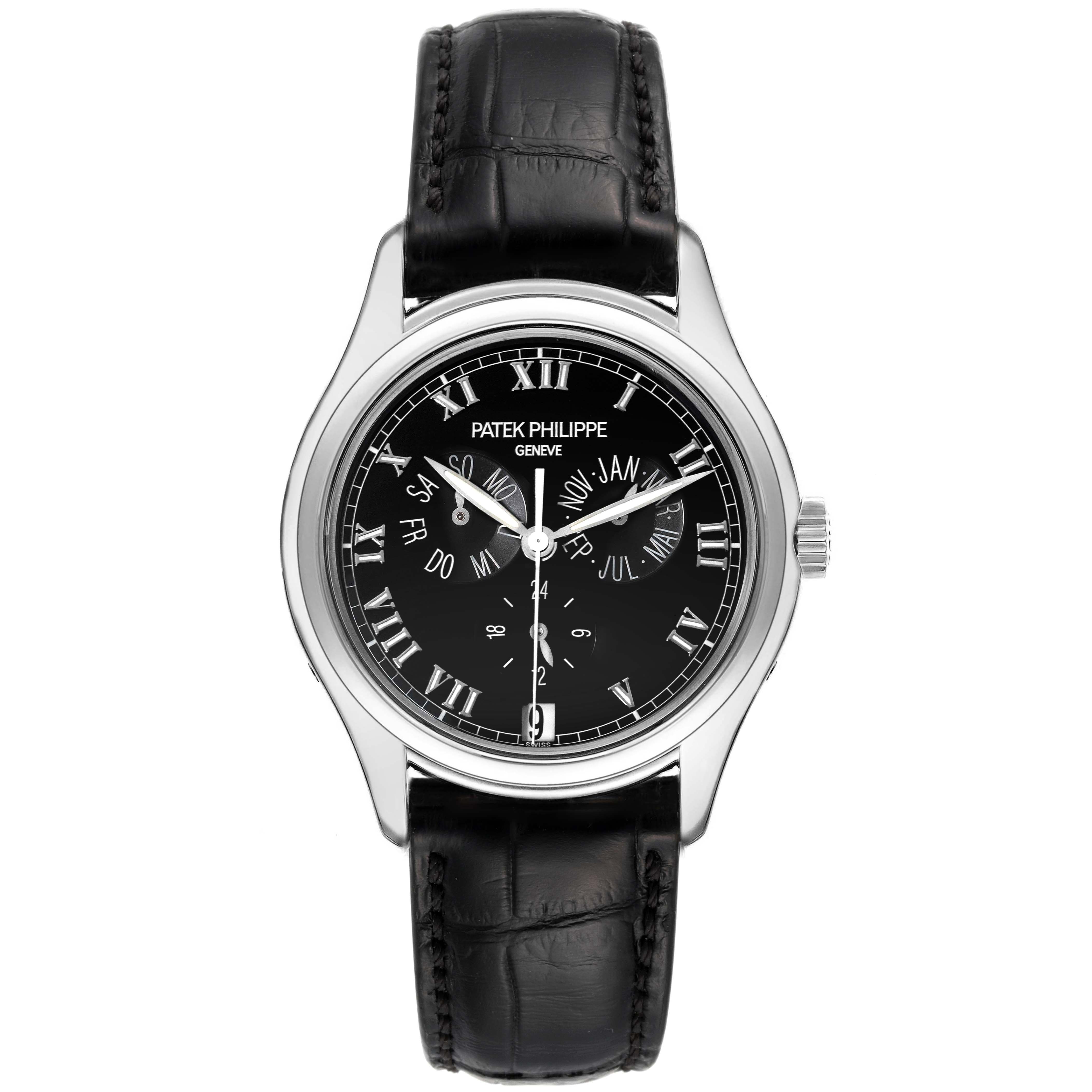 The image shows a front view of a Patek Philippe Complications 5035G Men's White Gold Black Dial 5035G Men's White Gold Black Dial watch with a black strap and black dial with Roman numerals.