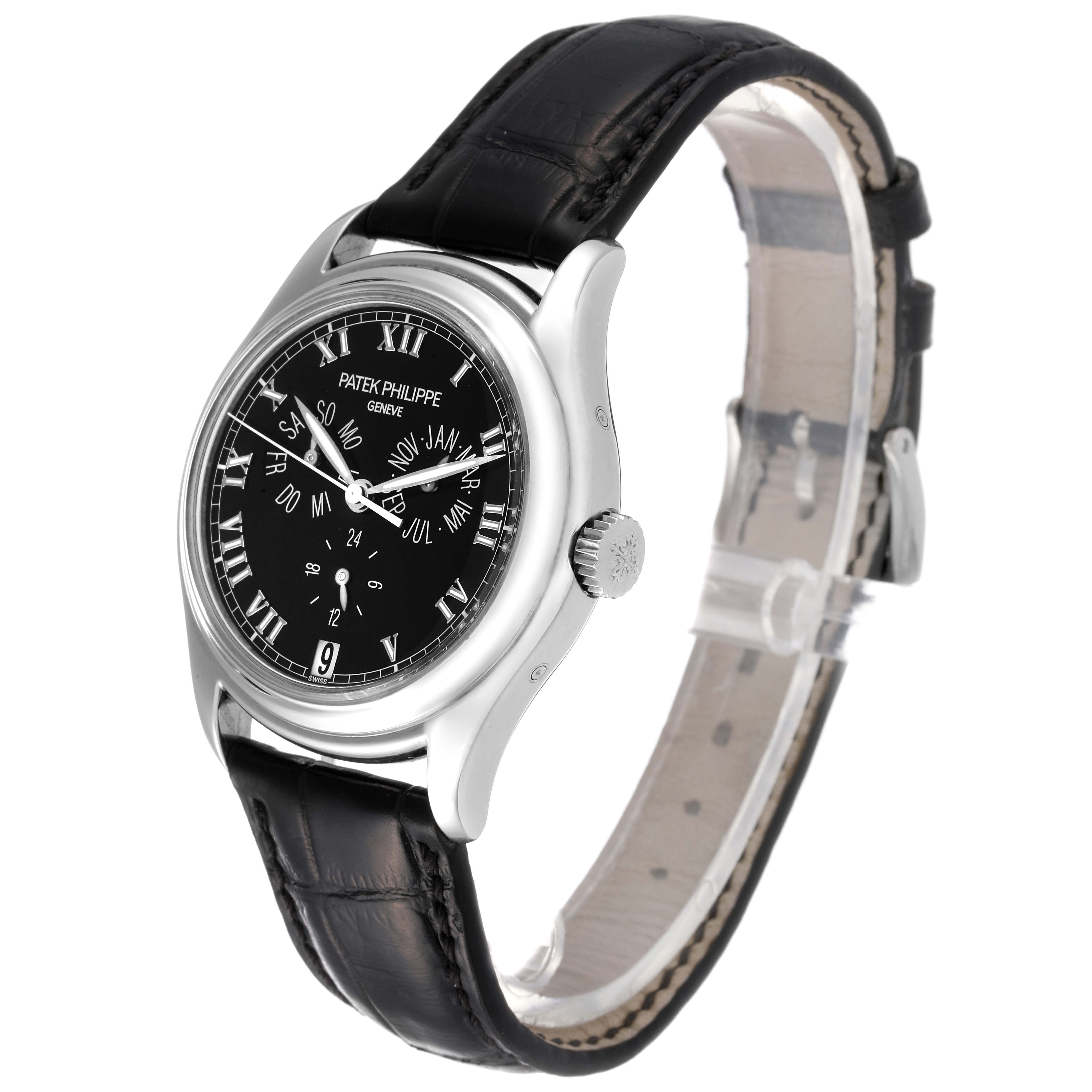 This image shows a Patek Philippe Complications 5035G Men's White Gold Black Dial 5035G Men's White Gold Black Dial model watch from a side angle, highlighting the black dial and leather strap.