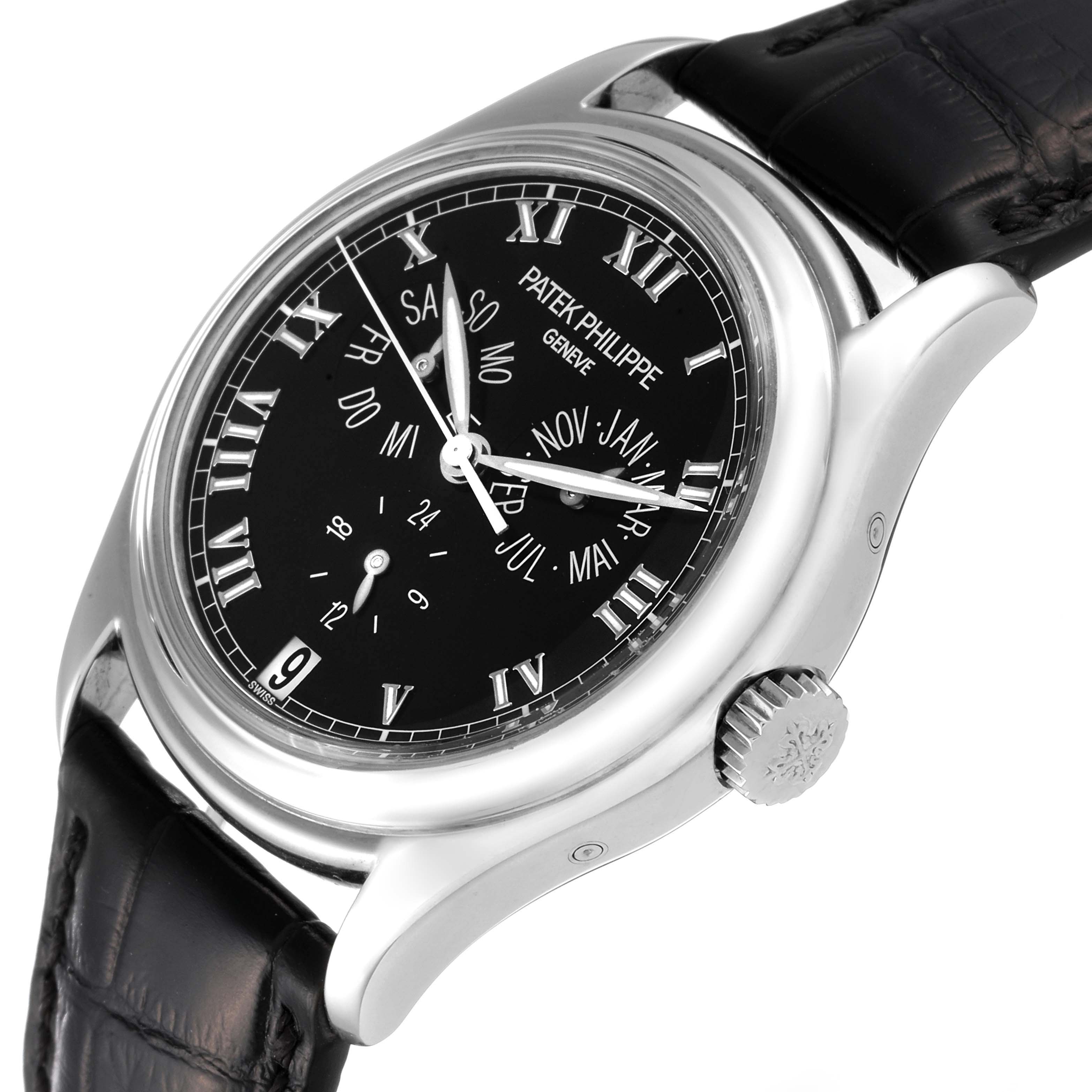 The image shows a Patek Philippe Complications 5035G Men's White Gold Black Dial 5035G Men's White Gold Black Dial model watch at a slight angle, displaying the dial, crown, and part of the black leather strap.