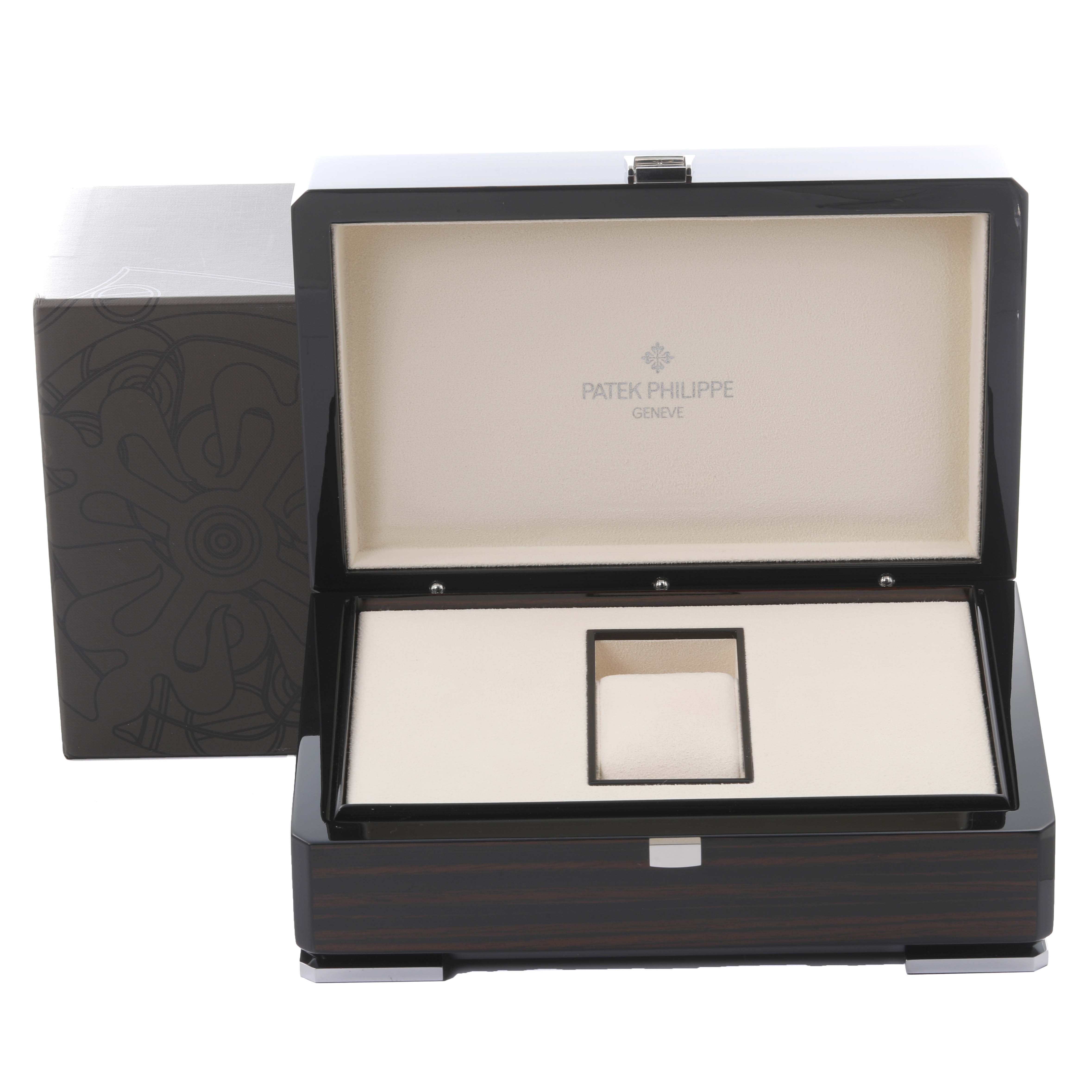 The image shows an open Patek Philippe Gondolo 5135R-001 Men's Rose Gold Silver Dial 5135R-001 Men's Rose Gold Silver Dial watch box, highlighting the interior with the brand name visible.