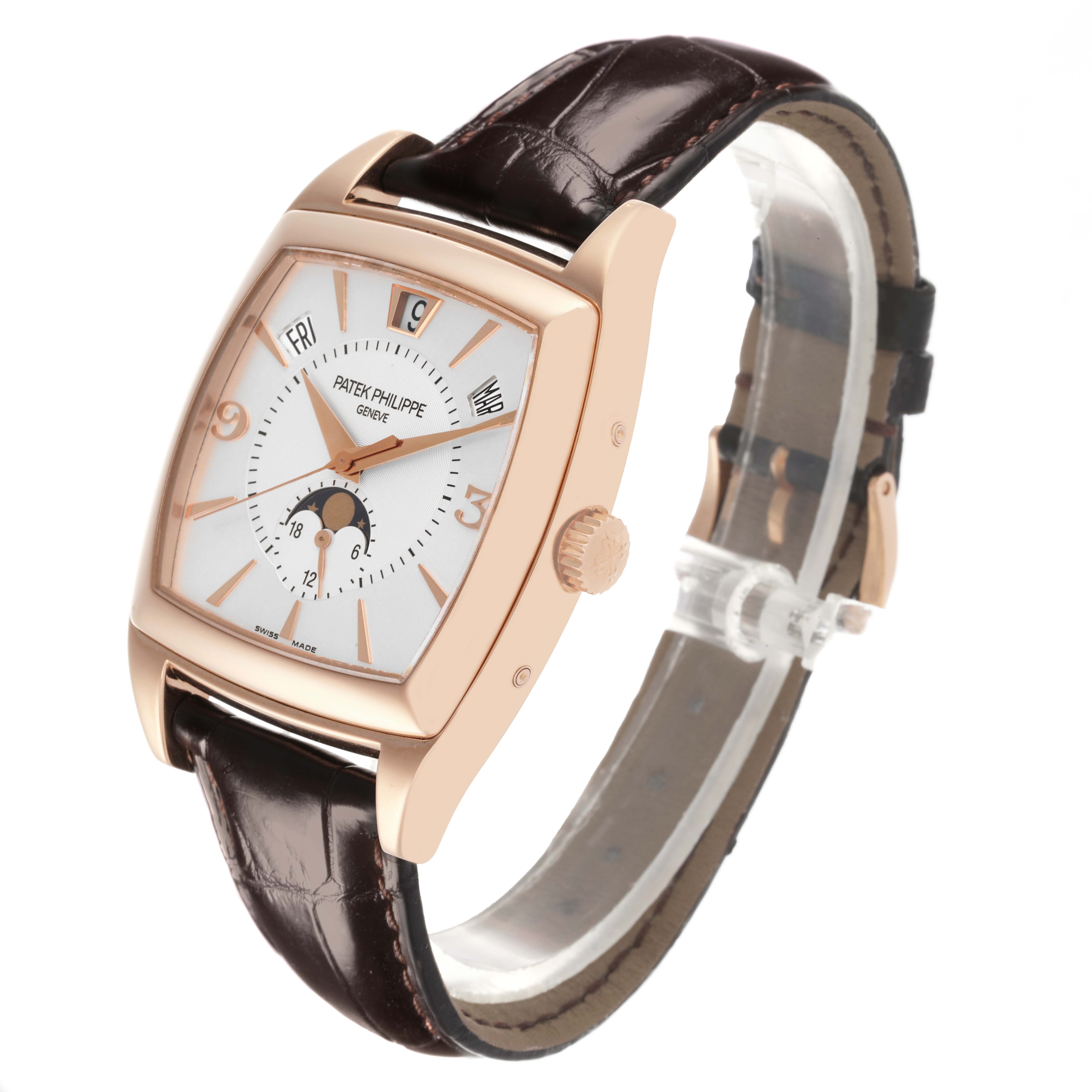 The Patek Philippe Gondolo 5135R-001 Men's Rose Gold Silver Dial 5135R-001 Men's Rose Gold Silver Dial watch is shown at a three-quarter angle, highlighting the dial, case, crown, and leather strap.