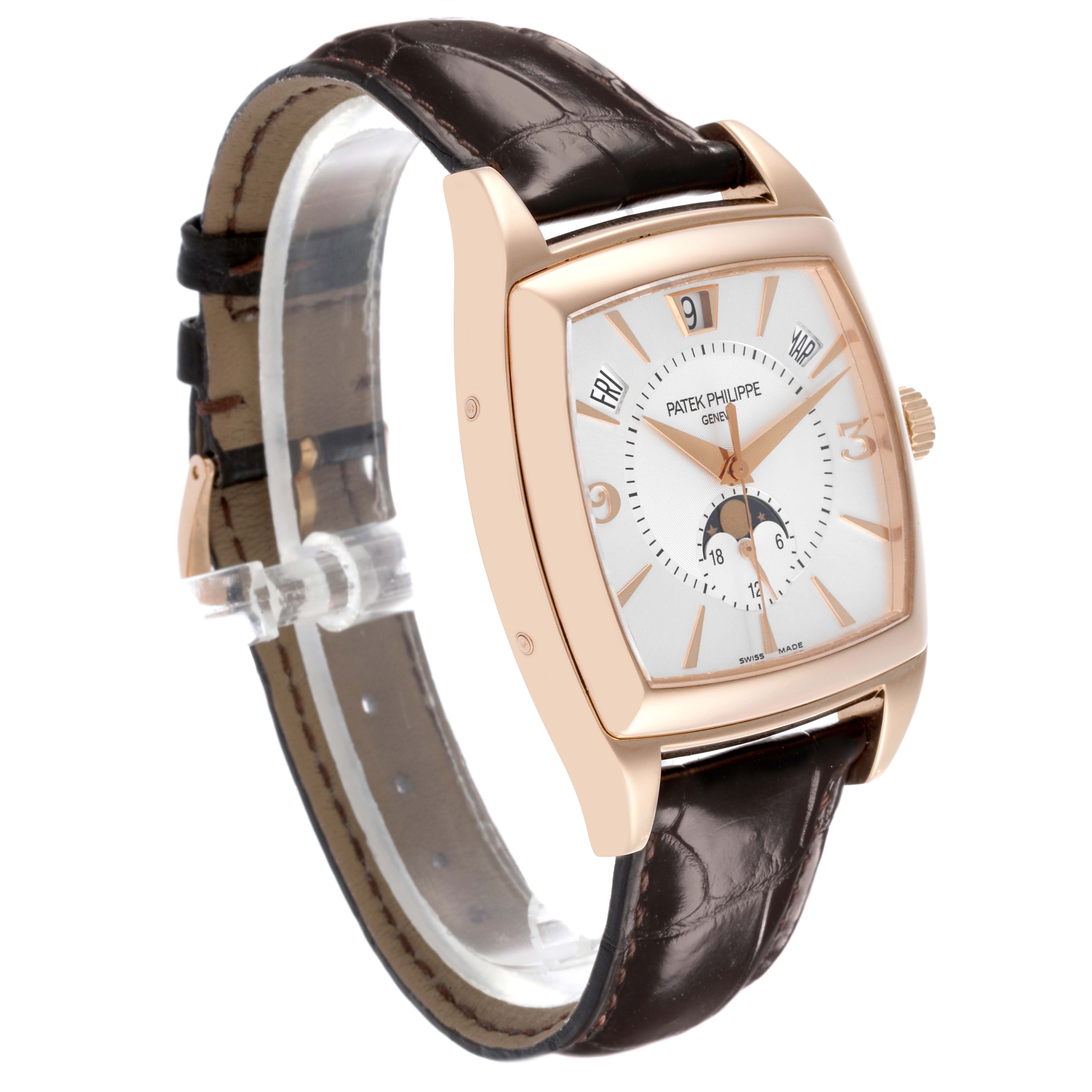 The Patek Philippe Gondolo 5135R-001 Men's Rose Gold Silver Dial 5135R-001 Men's Rose Gold Silver Dial watch is shown at a three-quarter angle, highlighting the dial, case, crown, and leather strap.