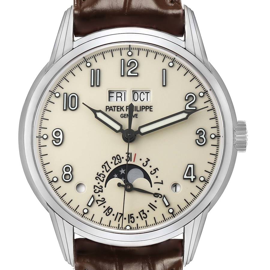 The image shows a front view of the Patek Philippe Complications 5320G Men's White Gold White Dial watch, displaying its dial, hands, and moon phase indicator.