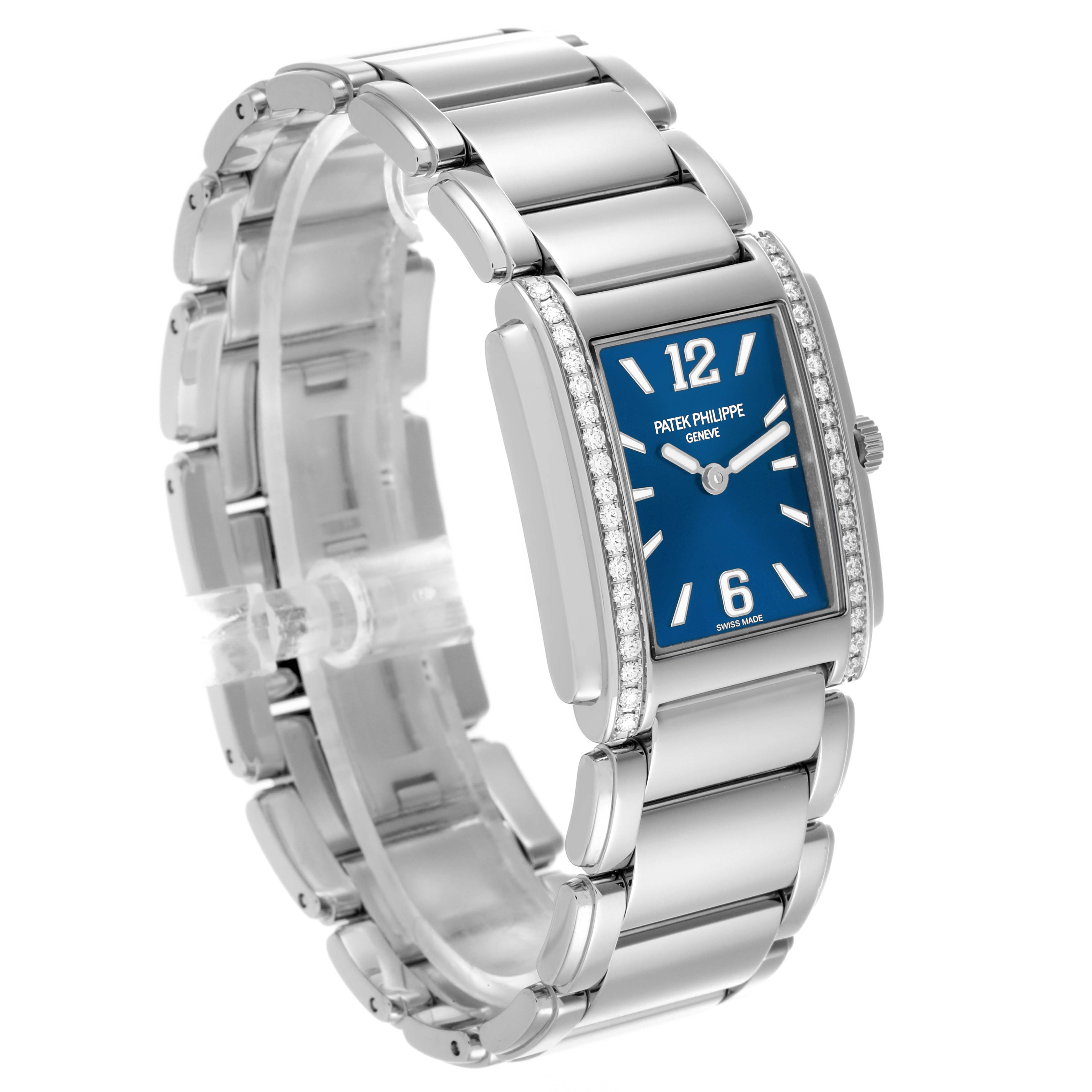 The Patek Philippe Twenty-4 4910/1200A-001 Women's Stainless Steel Blue Dial 4910/1200A-001 Women's Stainless Steel Blue Dial watch is shown at a three-quarter angle, highlighting its blue dial and diamond-set case.