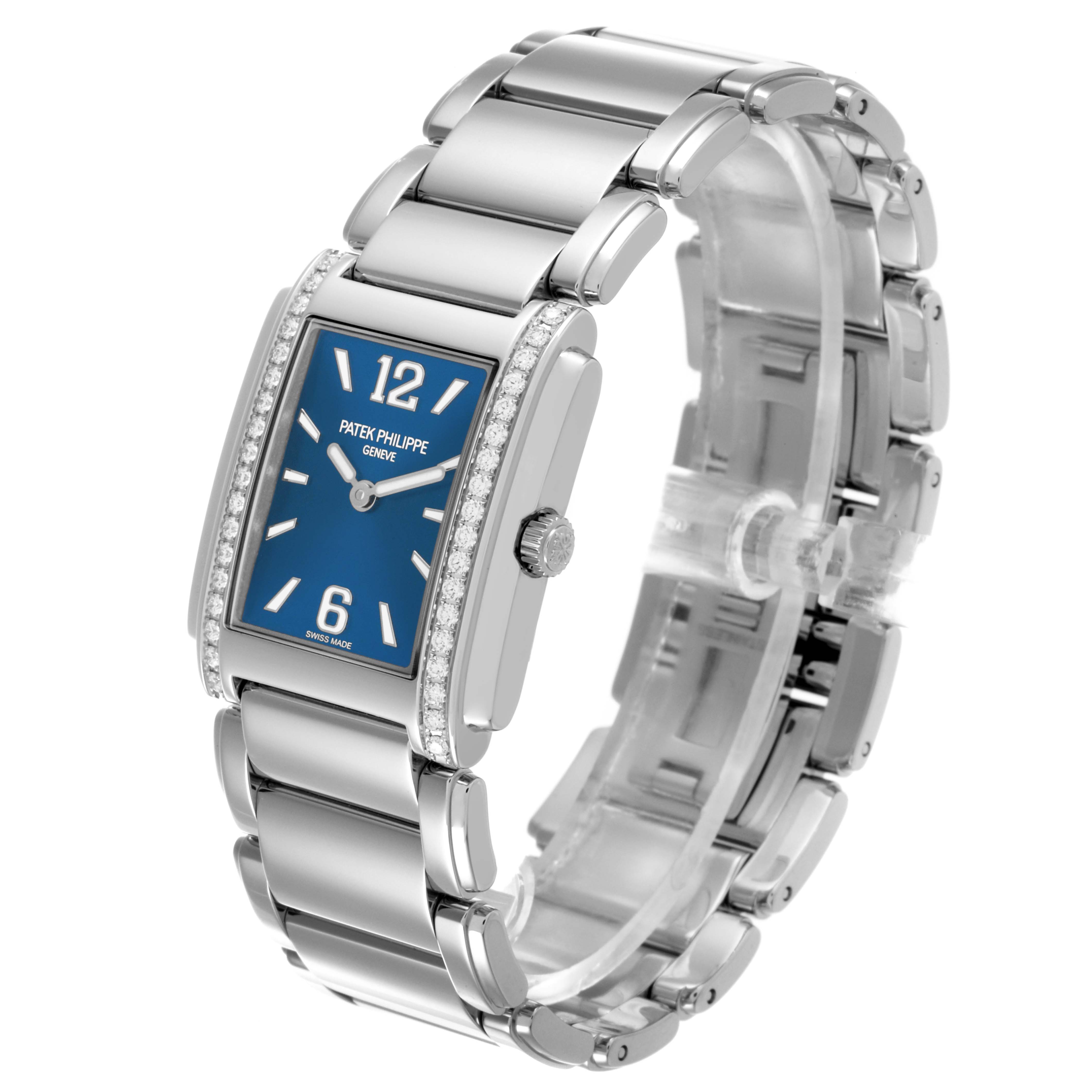 The Patek Philippe Twenty-4 4910/1200A-001 Women's Stainless Steel Blue Dial 4910/1200A-001 Women's Stainless Steel Blue Dial watch is shown at a three-quarter angle highlighting the bracelet, dial, and side with a crown.