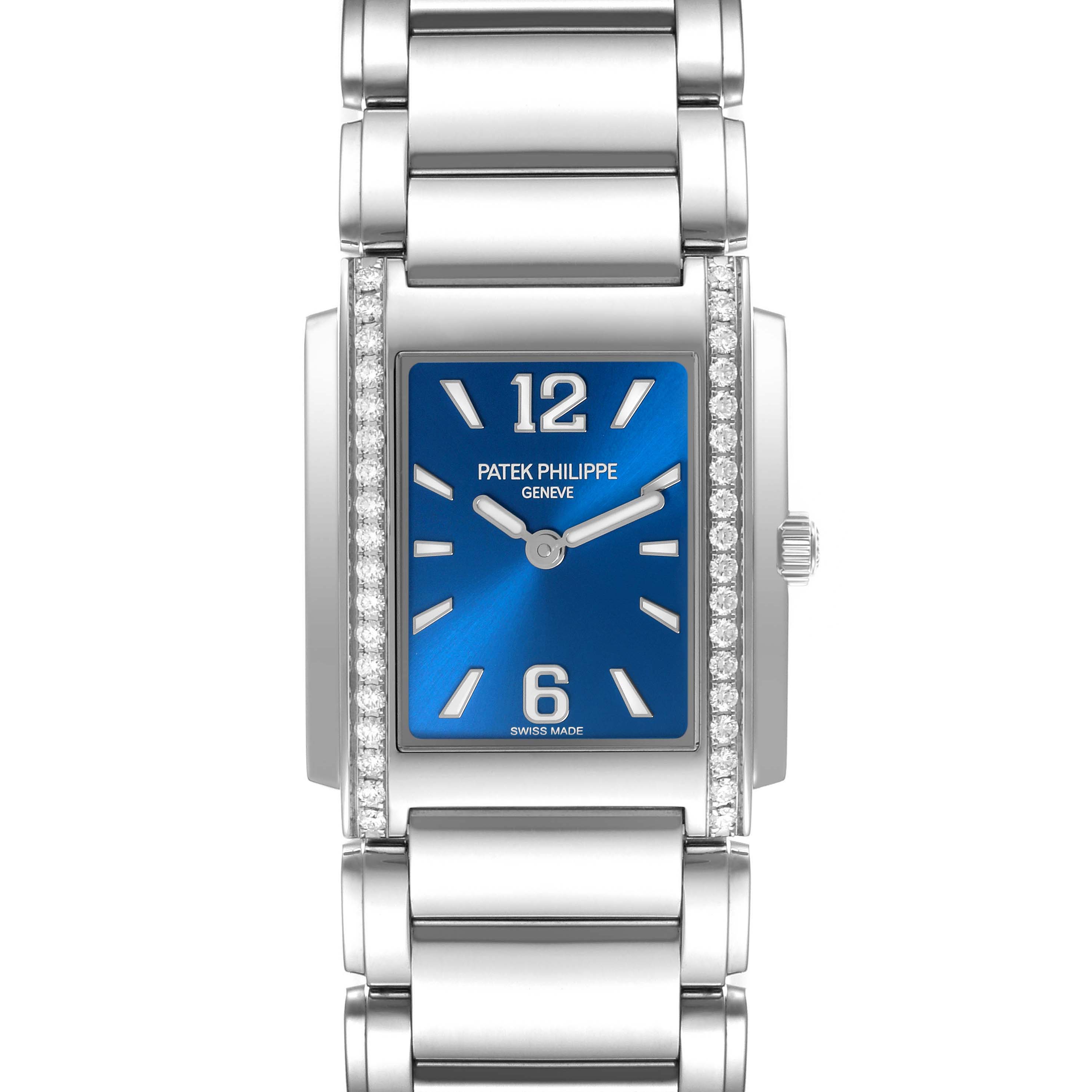 The Patek Philippe Twenty-4 4910/1200A-001 Women's Stainless Steel Blue Dial 4910/1200A-001 Women's Stainless Steel Blue Dial watch is shown from the front, highlighting the blue dial, bracelet, and diamond accents.