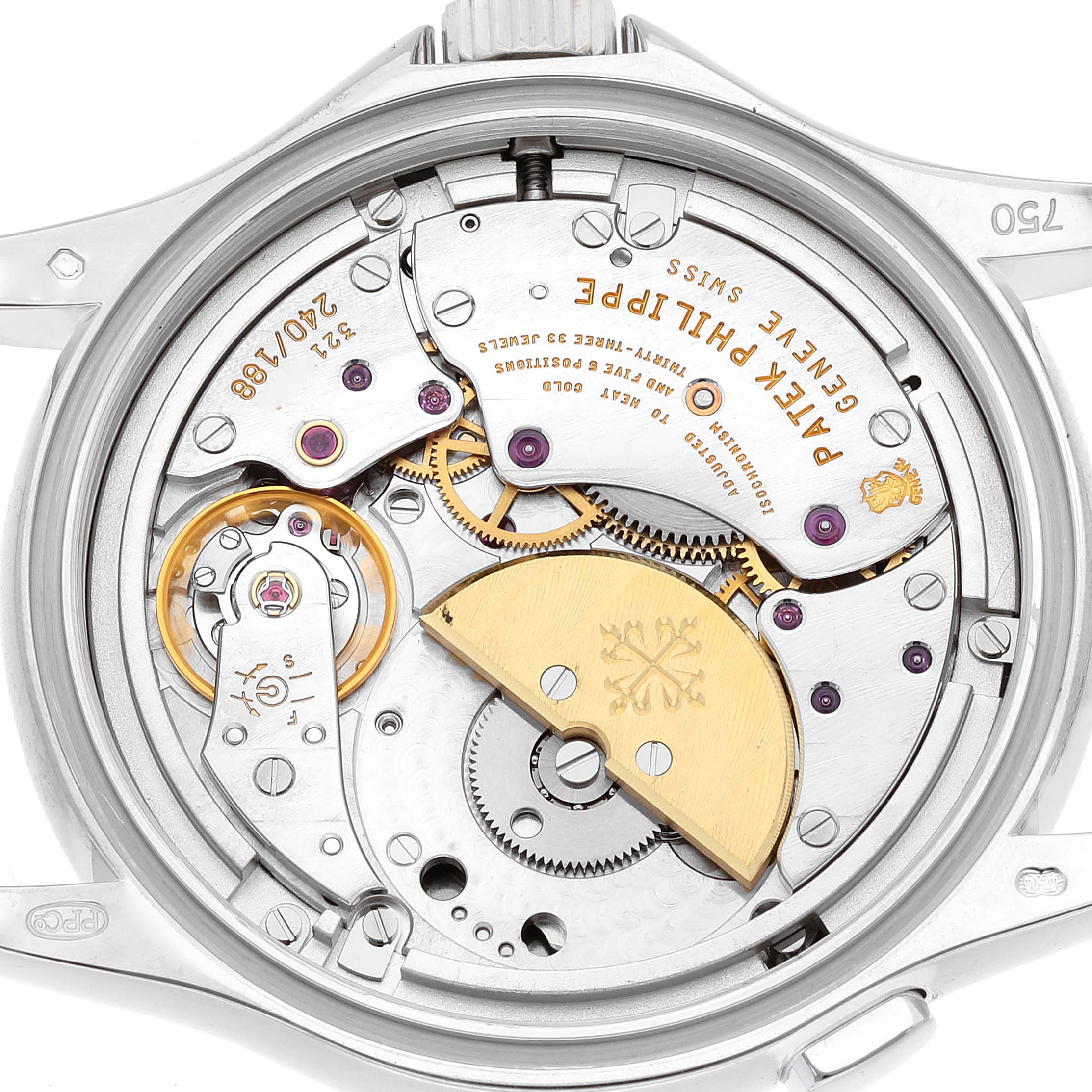 This close-up view shows the intricate movement and mechanisms of the Patek Philippe Complications 5110G Men
s White Gold Silver Dial 5110G Men
s White Gold Silver Dial watch model.