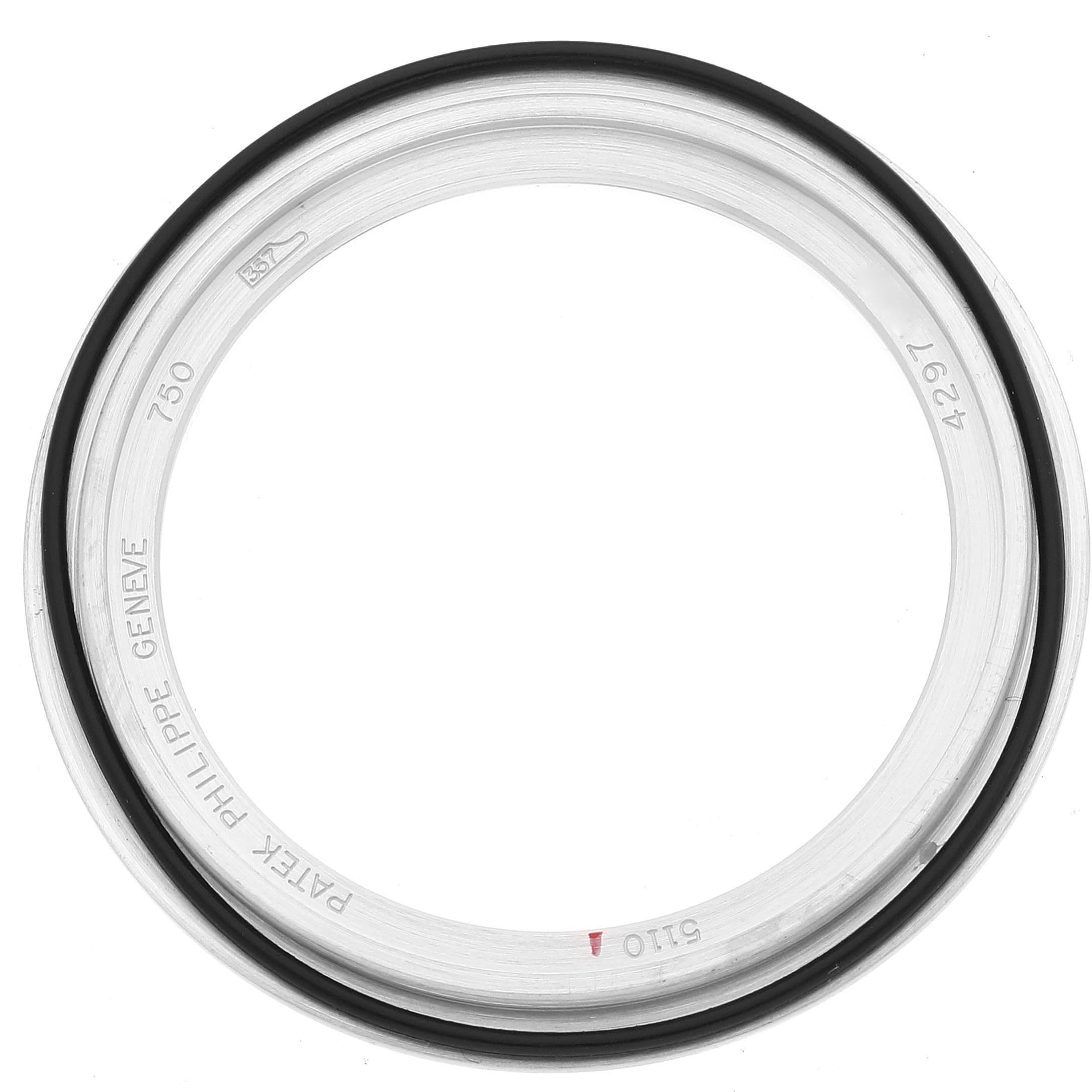 The image shows the bezel of a Patek Philippe Complications 5110G Men
s White Gold Silver Dial 5110G Men
s White Gold Silver Dial watch from a top-down angle.