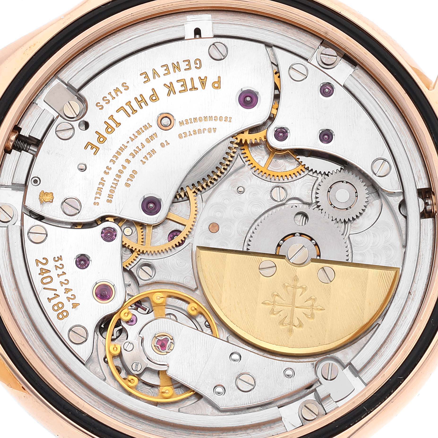 This image shows the intricate internal movement of a Patek Philippe Complications 5110R Men's Yellow Gold Silver Dial 5110R Men's Yellow Gold Silver Dial watch from a back case angle.