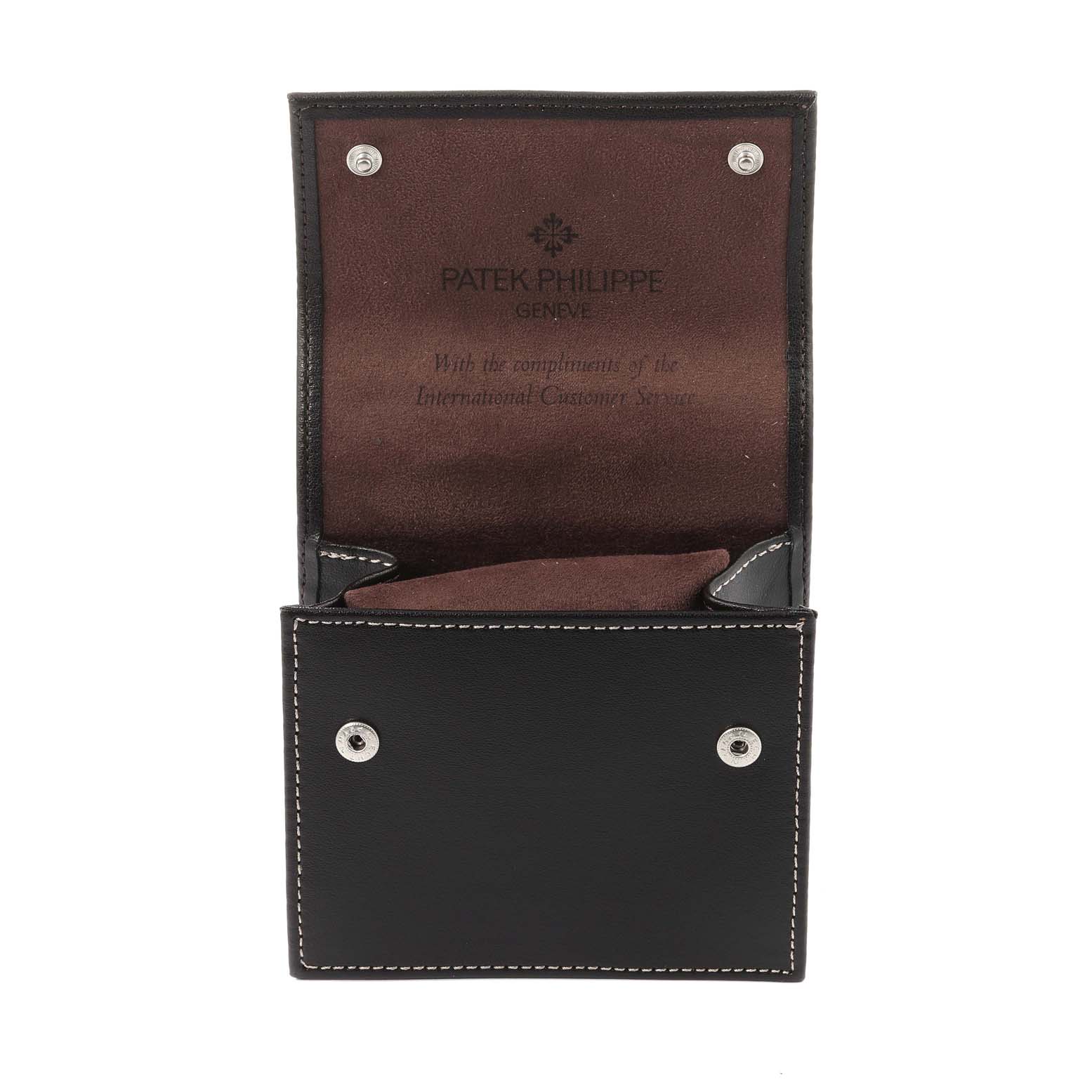 This image shows the open leather case for a Patek Philippe Complications 5110R Men's Yellow Gold Silver Dial 5110R Men's Yellow Gold Silver Dial model watch.