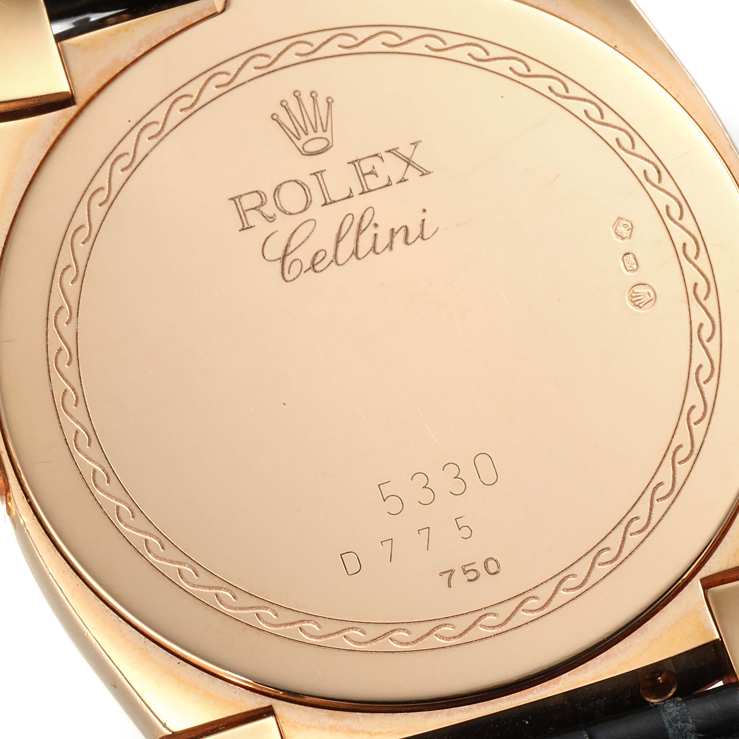 This image shows the back case of a Rolex Cellini 5330 Men's Rose Gold White Dial 5330 Men's Rose Gold White Dial watch, featuring branding and model details.