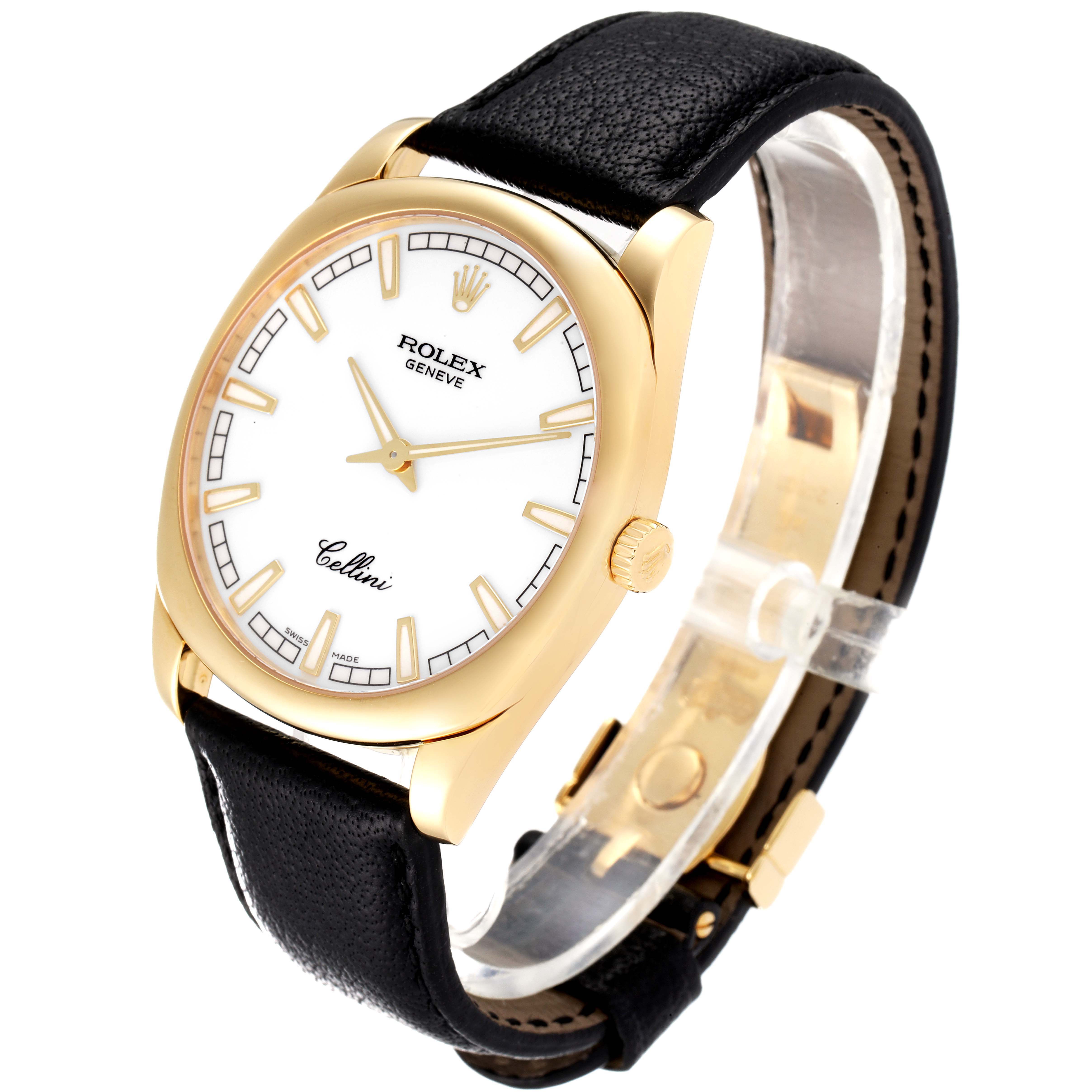 The Rolex Cellini 4243 Men's Yellow Gold White Dial 4243 Men's Yellow Gold White Dial watch is shown at an angle emphasizing the face, bezel, case, crown, and leather strap.