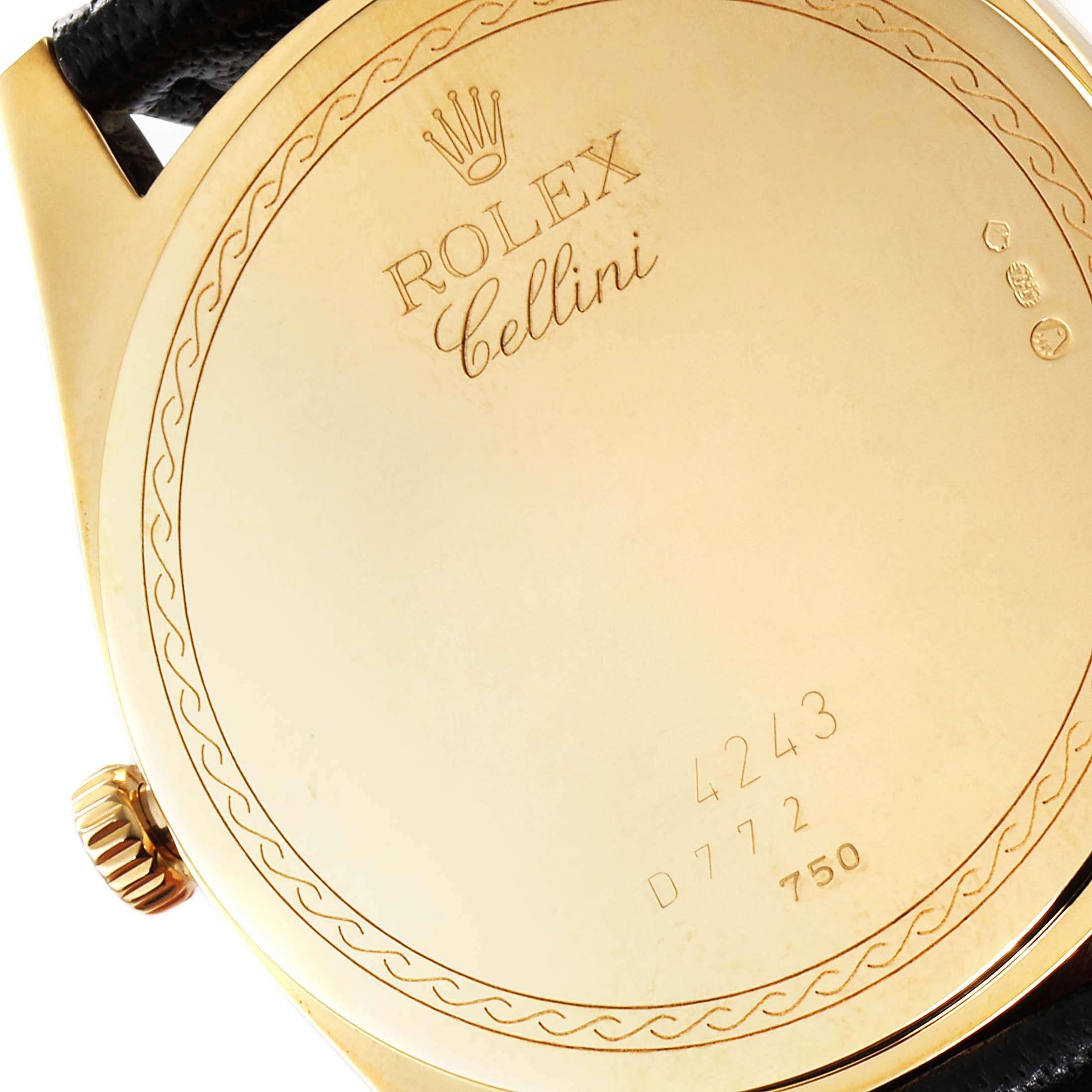 The image shows the back of a Rolex Cellini 4243 Men's Yellow Gold White Dial 4243 Men's Yellow Gold White Dial watch, highlighting the engraved branding, serial number, and strap attachment point.
