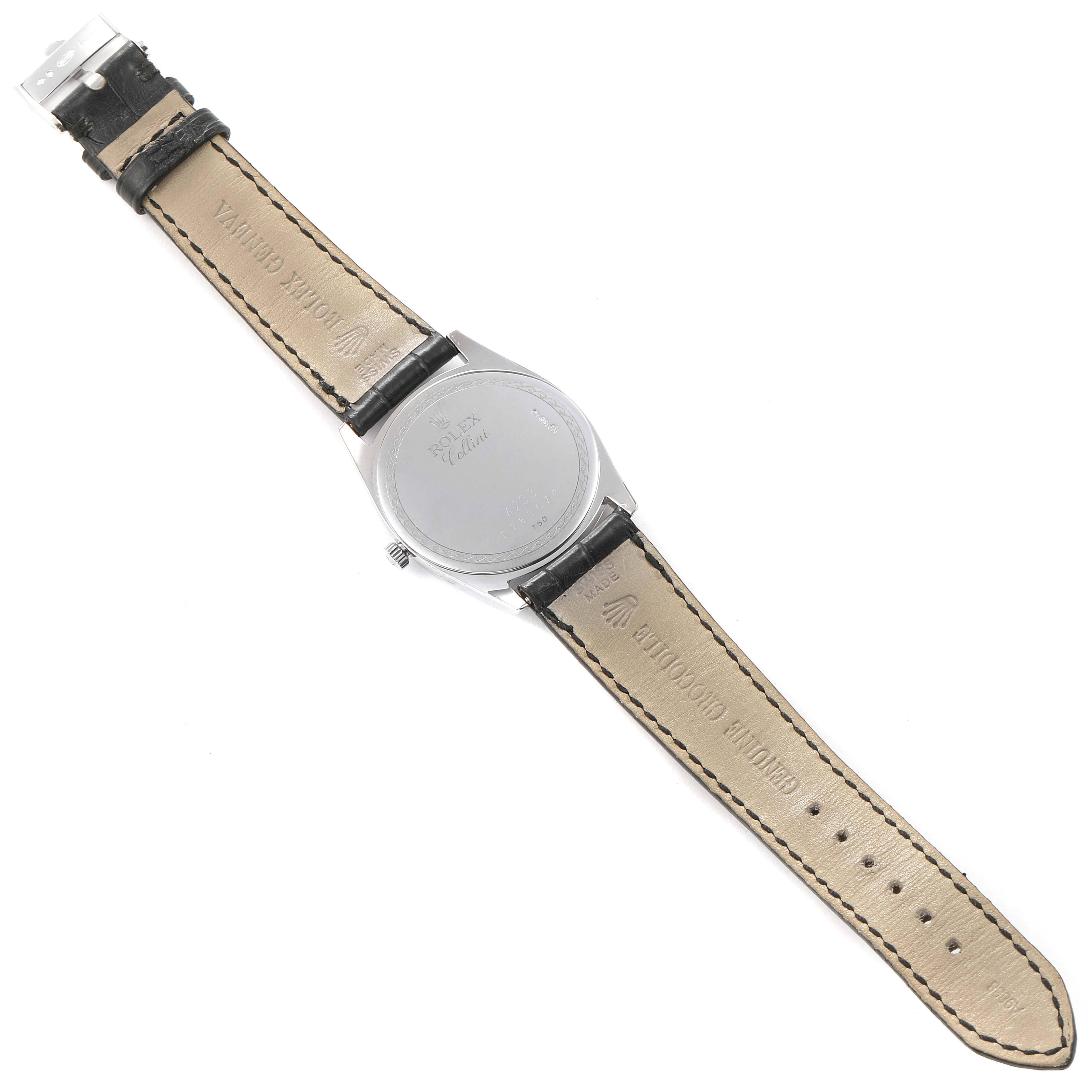 The image shows the back view of a Rolex Cellini 4233 Men
s White Gold Black Dial 4233 Men
s White Gold Black Dial model watch with its leather strap fully extended.