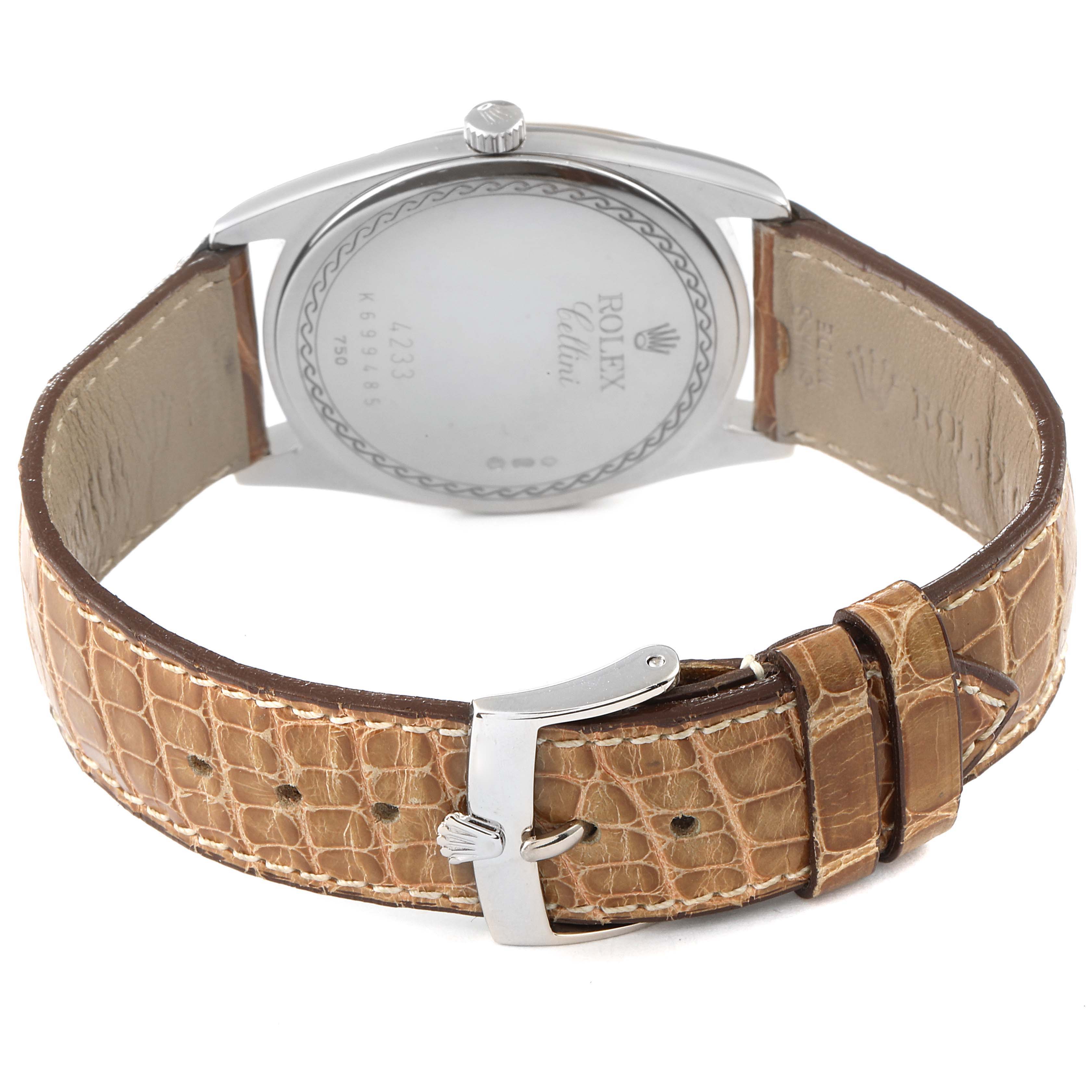 The image shows the back view of a Rolex Cellini 4233 Men's White Gold Black Dial 4233 Men's White Gold Black Dial watch, highlighting its case back, crown, and leather strap with buckle.