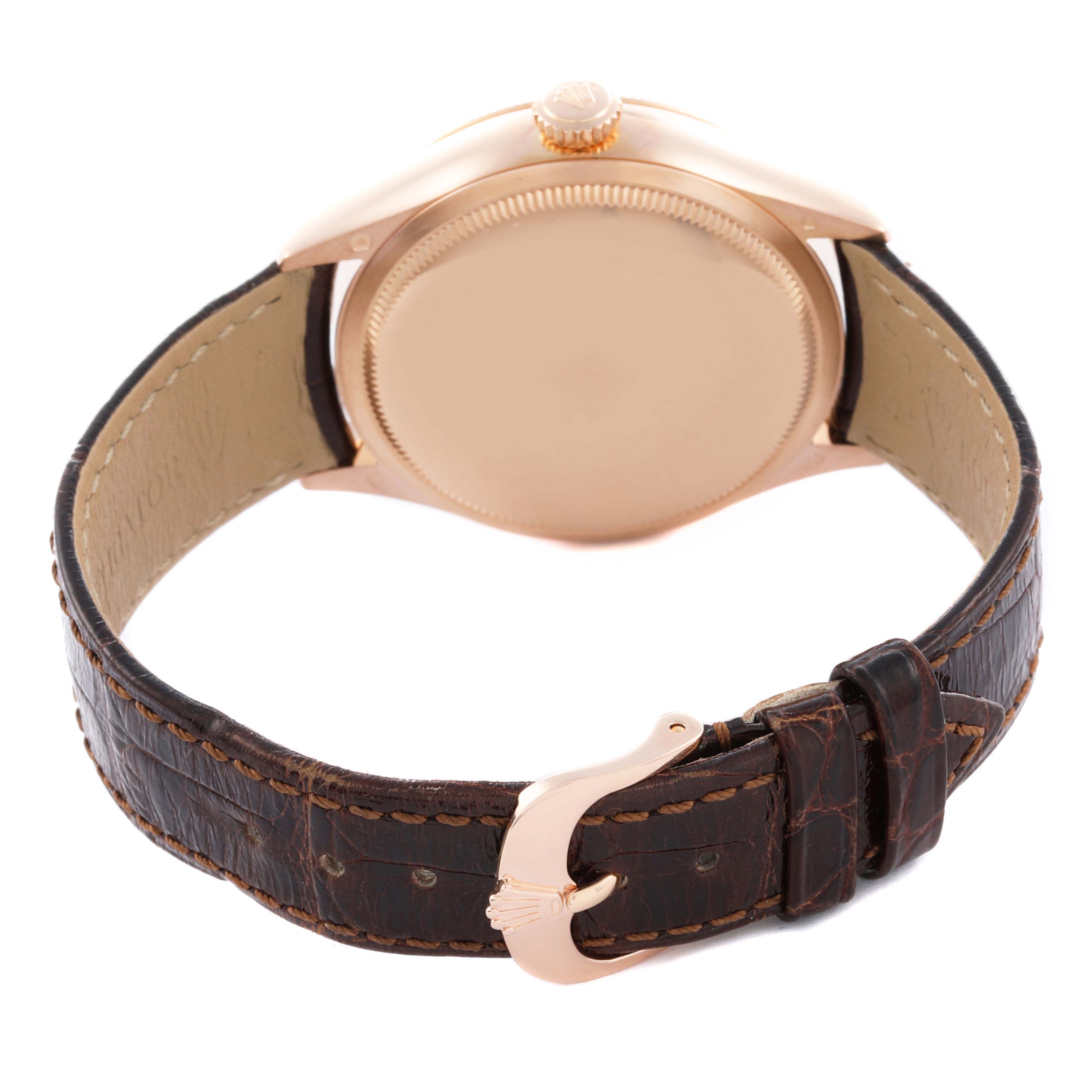 The image shows the back case and leather strap of a Rolex Cellini 50525 Men's Rose Gold Silver Dial 50525 Men's Rose Gold Silver Dial watch from a rear angle.