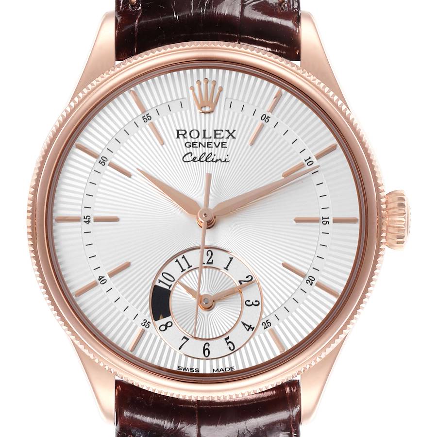 The Rolex Cellini model watch is shown from a front angle, displaying its dial, hands, crown, and brown leather strap.