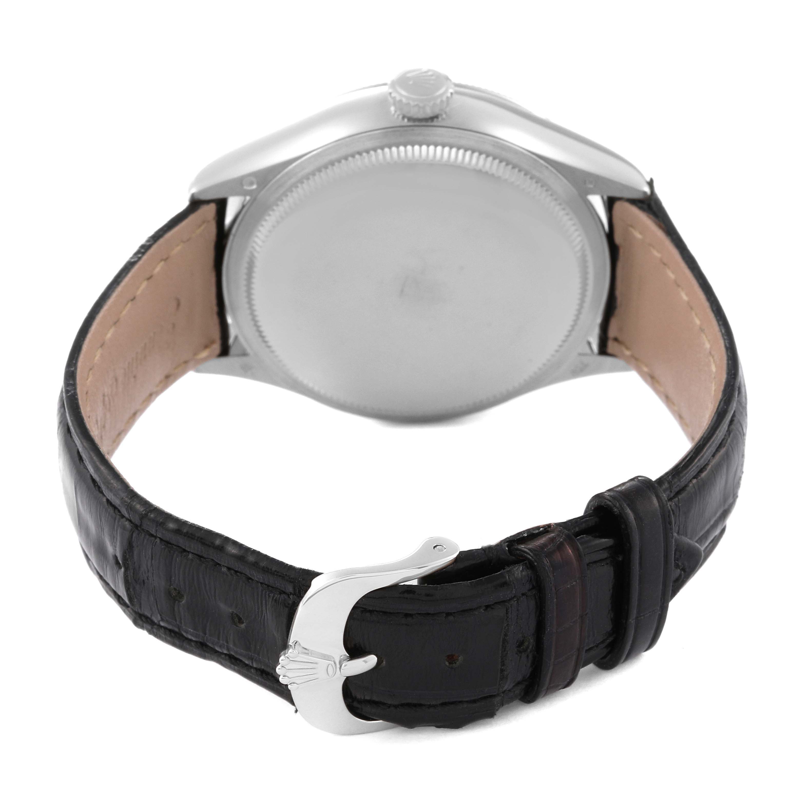 The image shows the back of a Rolex Cellini 50529 Men's White Gold Black Dial 50529 Men's White Gold Black Dial watch, highlighting the case back, crown, and black leather strap with a metal buckle.