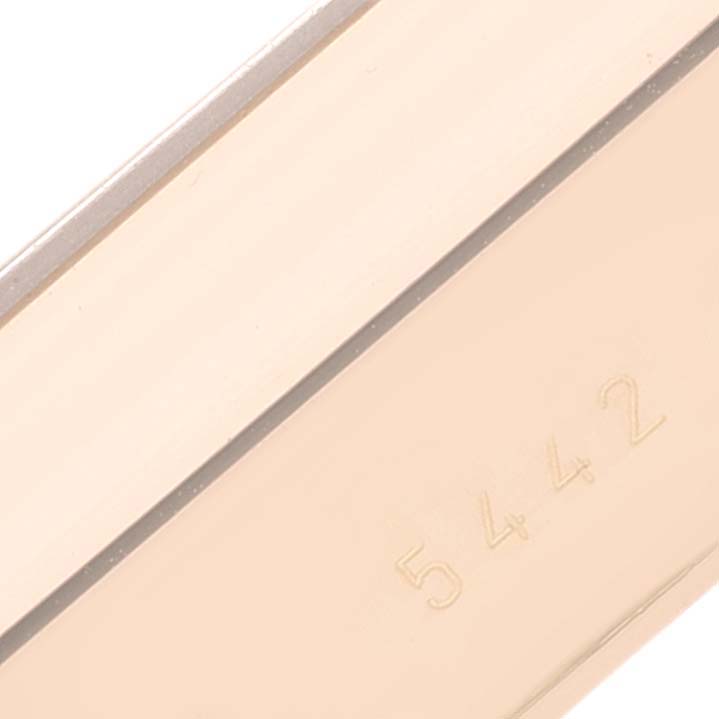 This close-up image shows the side profile of a Rolex Cellini 5442 Men's Rose Gold Black Dial 5442 Men's Rose Gold Black Dial watch case with the number 5442 engraved.