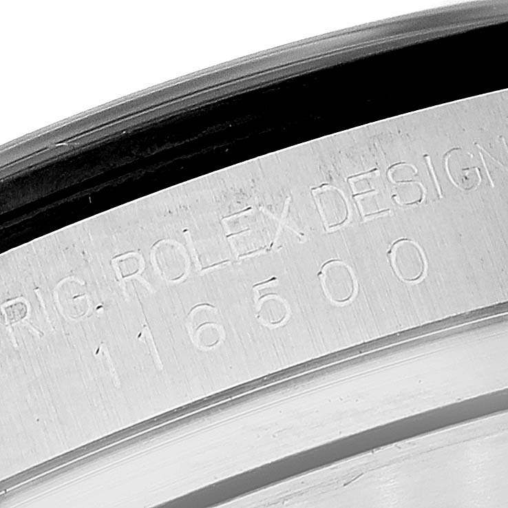 This image shows a close-up view of the serial number on the case of a Rolex Daytona 116500 Men's Stainless Steel Black Dial 116500 Men's Stainless Steel Black Dial watch, model 116500.