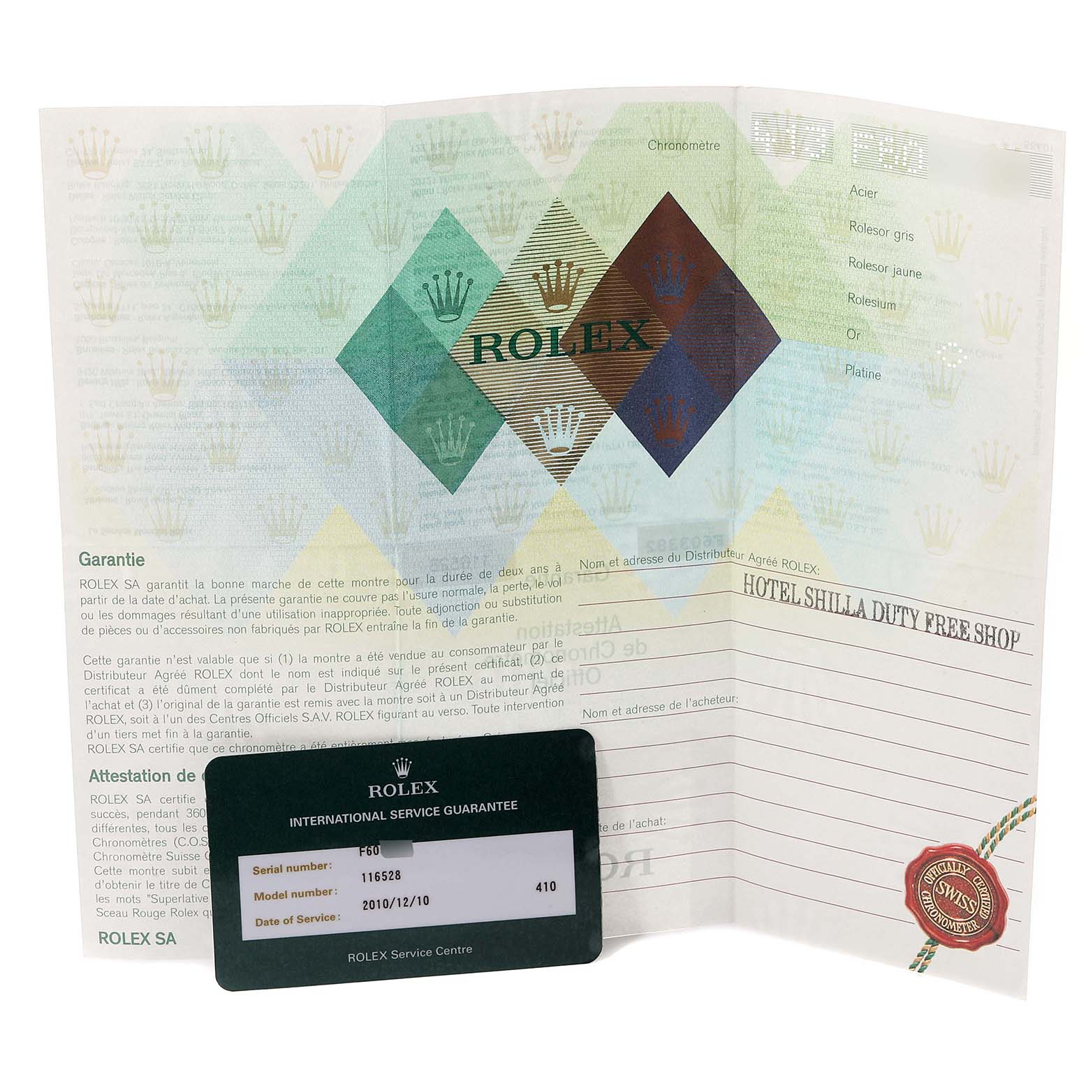 The image shows the warranty card and international service guarantee card for a Rolex Daytona 116528 Men's Yellow Gold Black Dial 116528 Men's Yellow Gold Black Dial model.