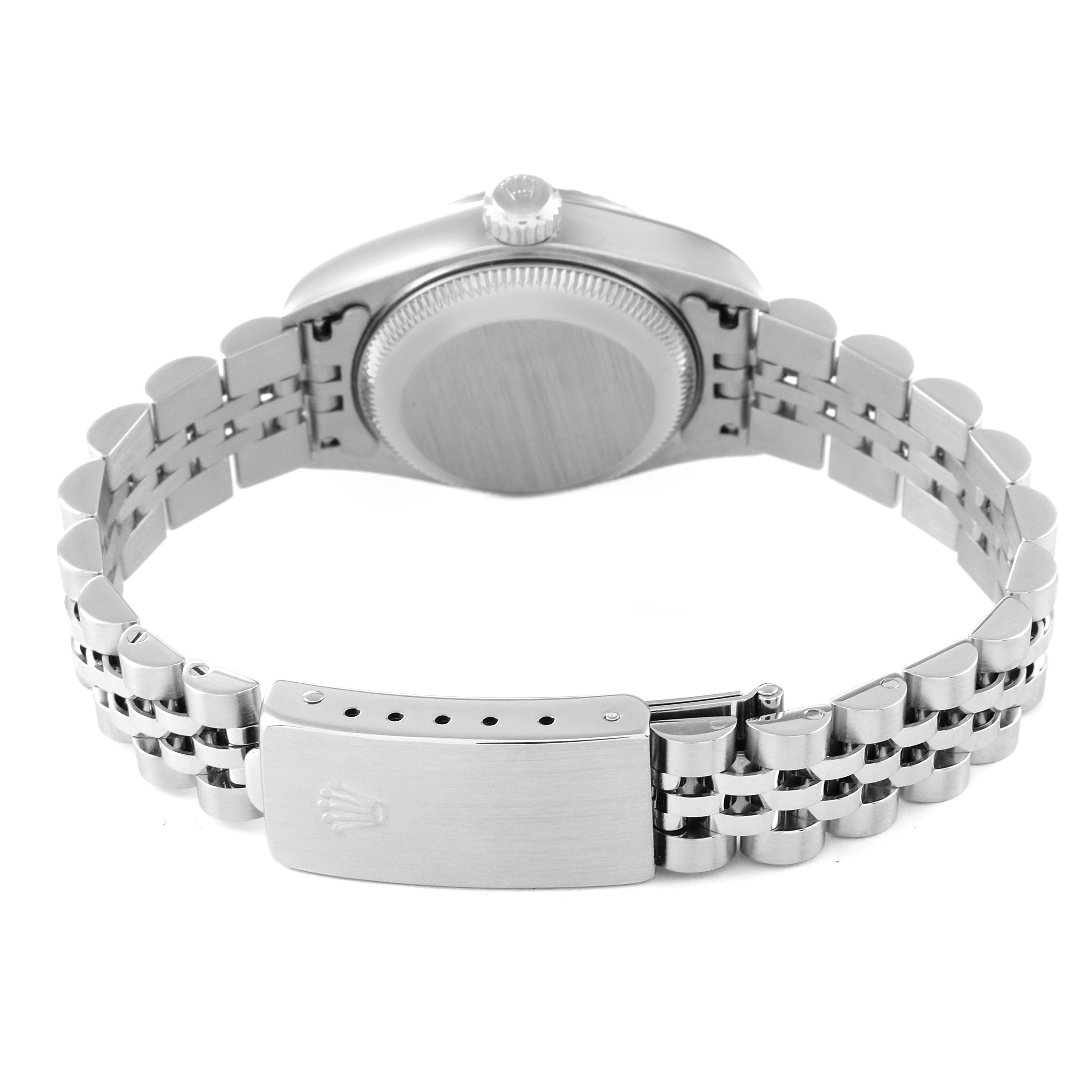 This image shows the back of a Rolex Datejust 79240 Women's Stainless Steel Silver Dial 79240 Women's Stainless Steel Silver Dial watch, including the case back and the bracelet with the clasp.