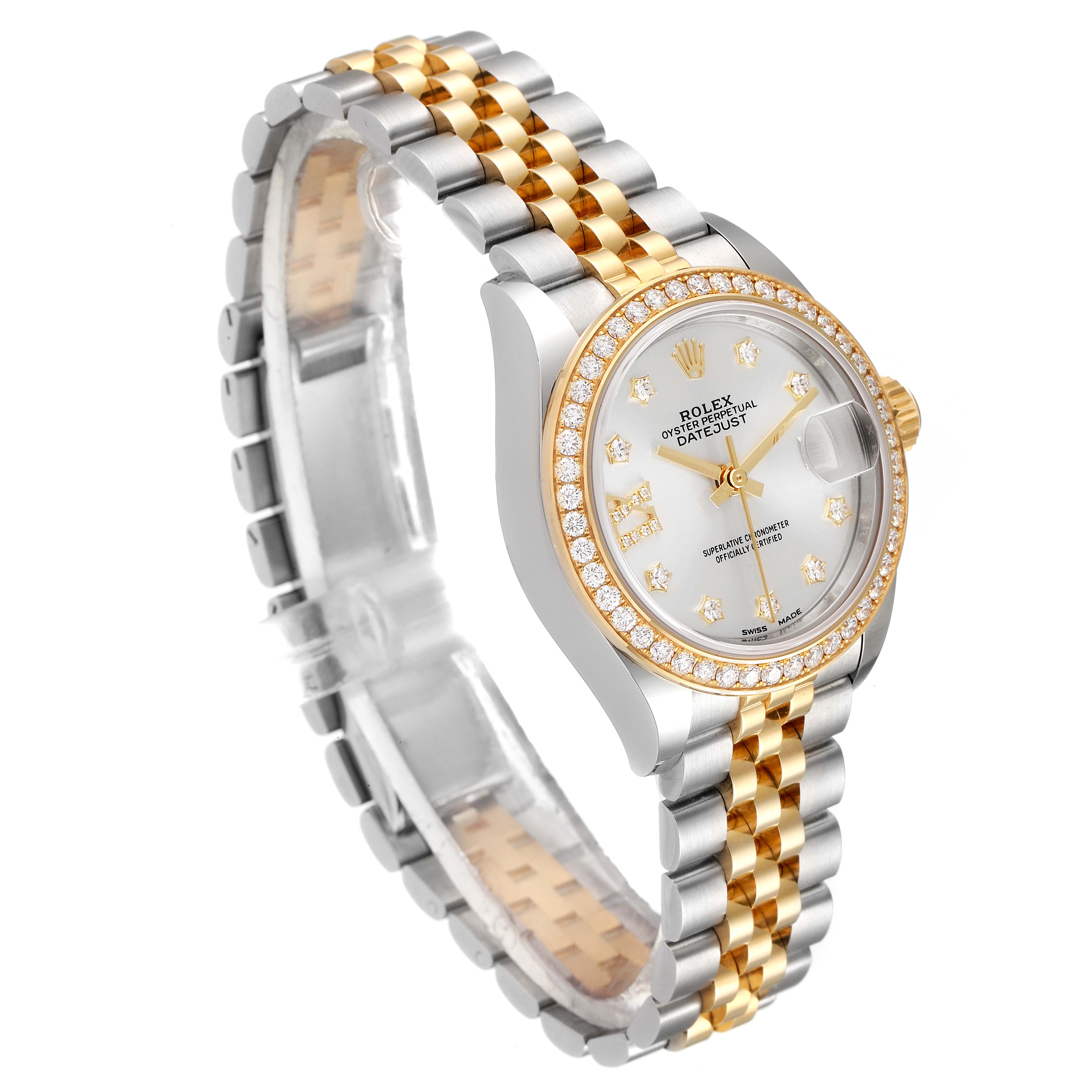 The Rolex Datejust 279383 Women
s Steel and Gold (two tone) Silver Dial 279383 Women
s Steel and Gold (two tone) Silver Dial watch is shown from a three-quarter angle, highlighting the gold and silver bracelet, dial, and diamond bezel.