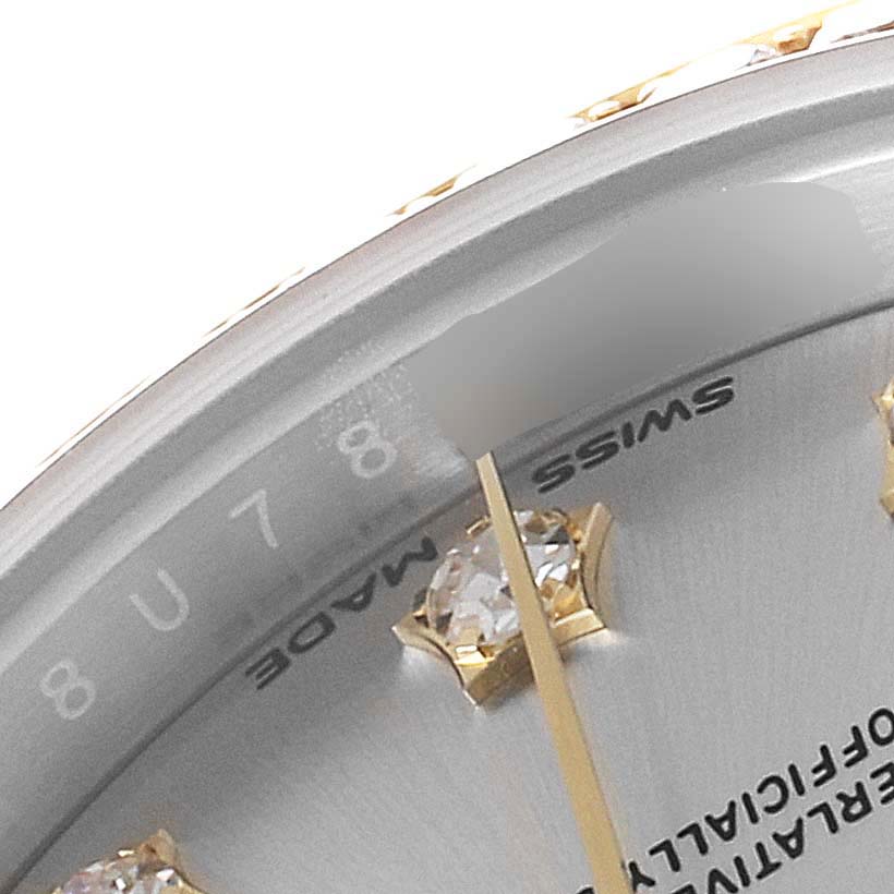 This close-up image shows the "Swiss Made" text, minute hand, and diamond markers on the dial of a Rolex Datejust 279383 Women
s Steel and Gold (two tone) Silver Dial 279383 Women
s Steel and Gold (two tone) Silver Dial watch.