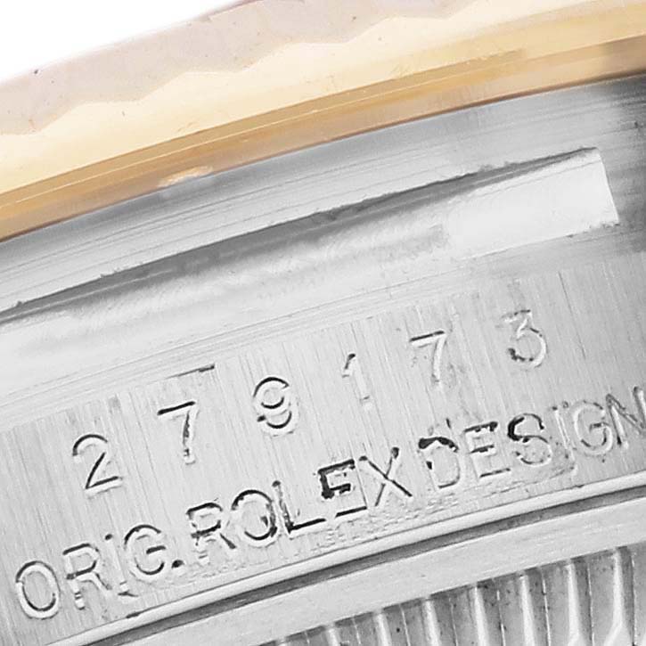 The image shows a close-up of the engraved case side of a Rolex Datejust 279173 Women's Steel and Gold (two tone) Champagne Dial 279173 Women's Steel and Gold (two tone) Champagne Dial, highlighting the model number and design text.