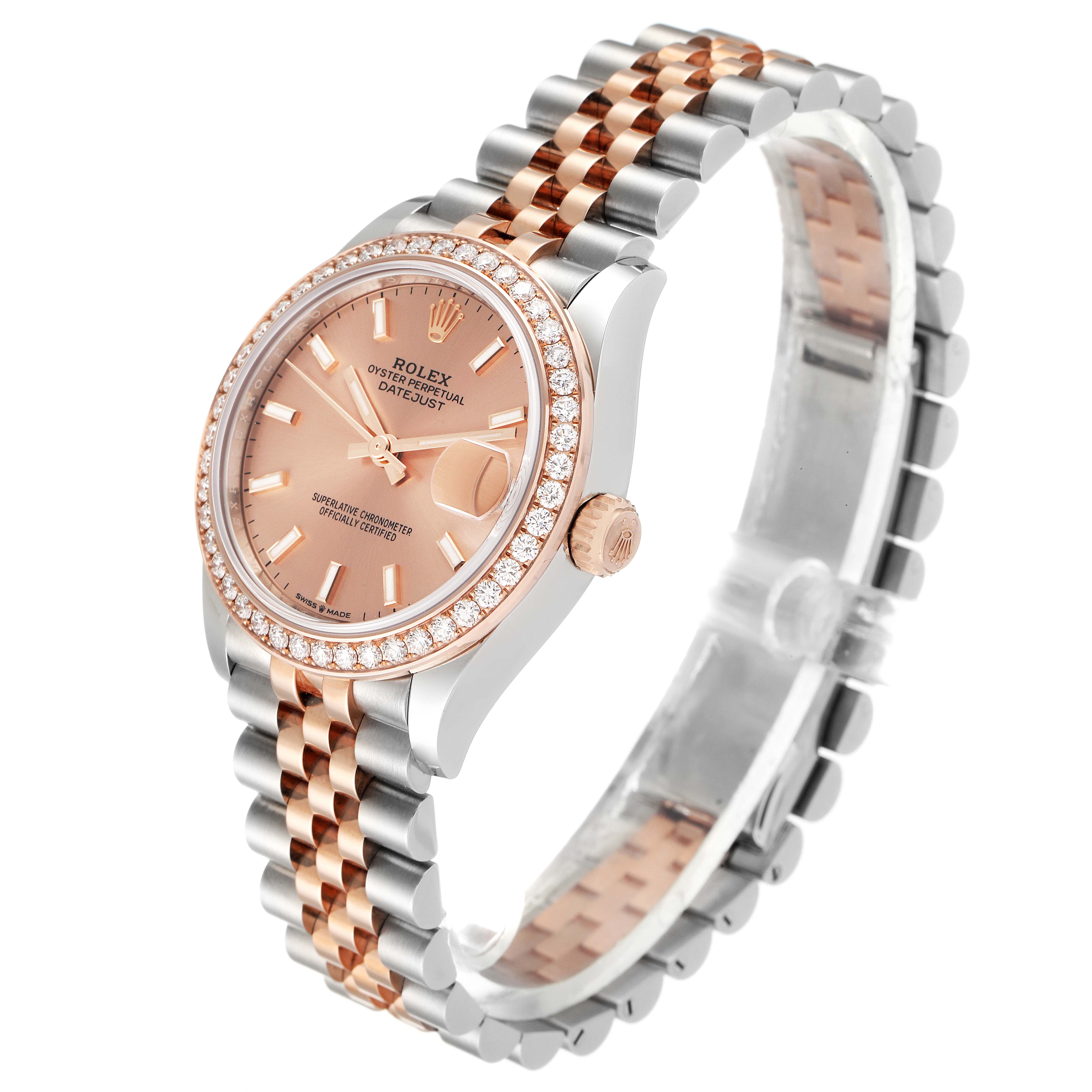This Rolex Mid-Size 278381 Women's Steel and Gold (two tone) Pink Dial 278381 Women's Steel and Gold (two tone) Pink Dial Datejust watch is shown from a three-quarter angle, highlighting the dial, bezel, case, and bracelet.