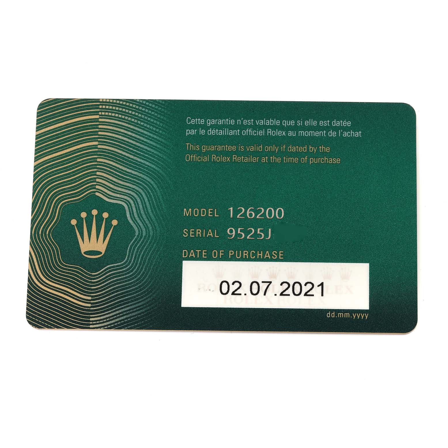 This is a close-up of a Rolex Datejust 126200 Men's Stainless Steel Blue Dial 126200 Men's Stainless Steel Blue Dial model 126200 guarantee card with serial number 9525J and purchase date of 02.07.2021.