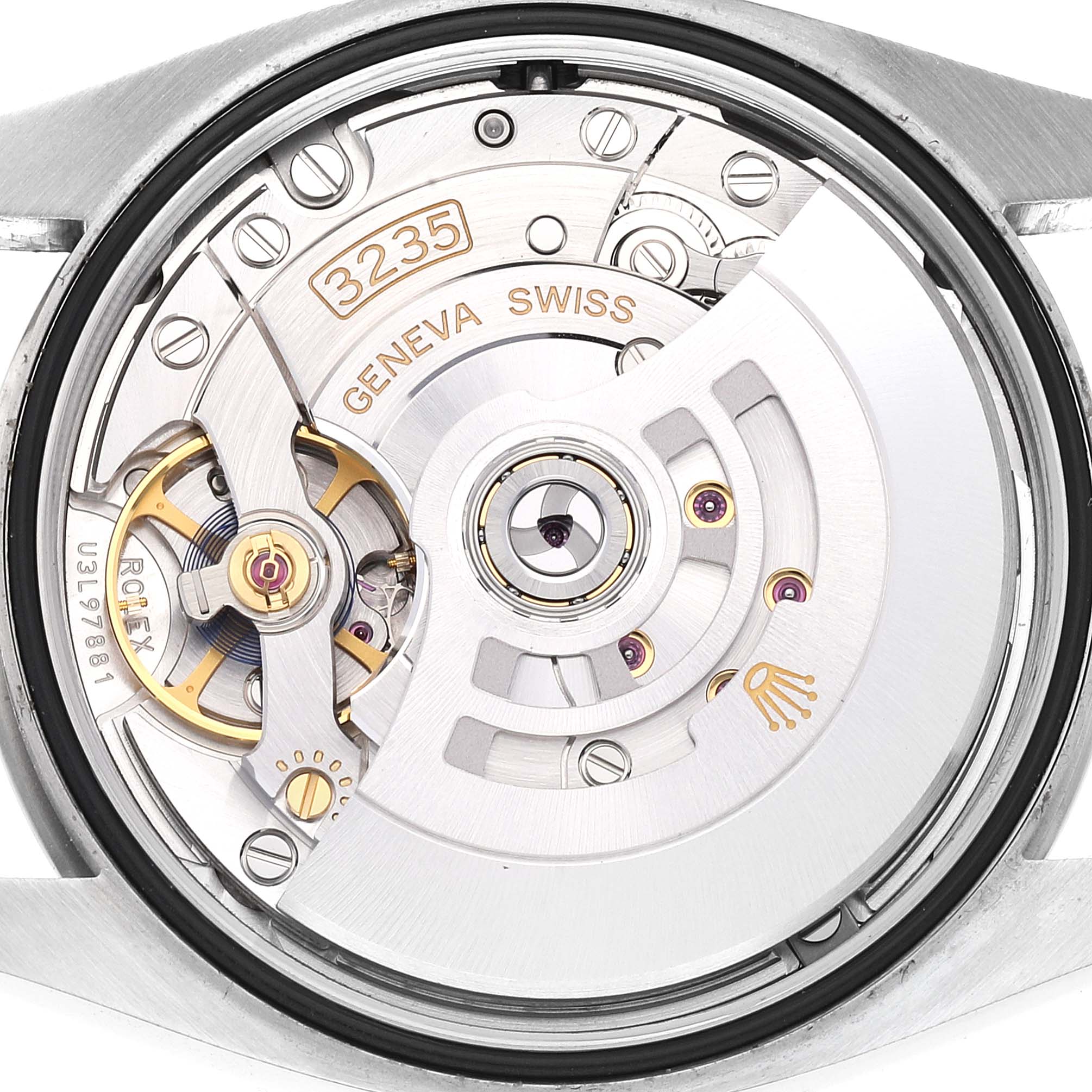 The image shows the movement mechanism of a Rolex Datejust 126200 Men's Stainless Steel Blue Dial 126200 Men's Stainless Steel Blue Dial watch from a back view angle.