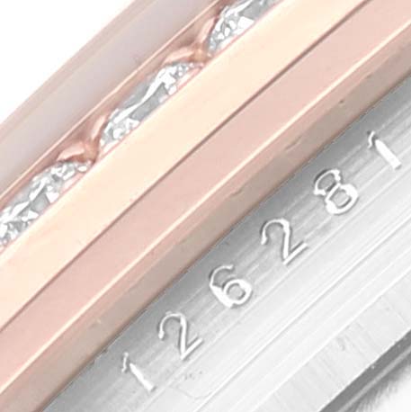 This image shows a close-up of the serial number engraving on the side of a Rolex Datejust 126281 Men's Steel and Gold (two tone) Silver Dial 126281 Men's Steel and Gold (two tone) Silver Dial watch.