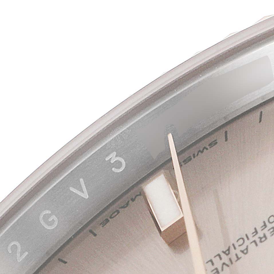 The image shows a close-up of the dial and hour markers of a Rolex Datejust 41 126331 Men's Steel and Gold (two tone) Beige Dial 126331 Men's Steel and Gold (two tone) Beige Dial watch.