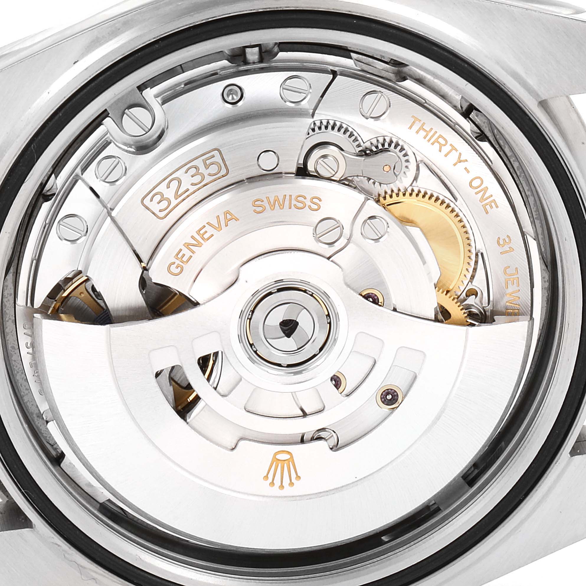 This image shows the internal movement mechanism of the Rolex Datejust 41 126334 Men
s Stainless Steel Blue Dial 126334 Men
s Stainless Steel Blue Dial, highlighting gears and engravings.
