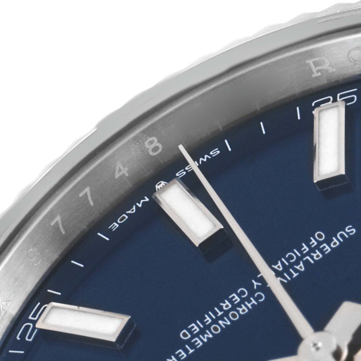 This image shows an angled close-up of the dial and part of the bezel of a Rolex Datejust 41 126334 Men
s Stainless Steel Blue Dial 126334 Men
s Stainless Steel Blue Dial watch, highlighting the markers.