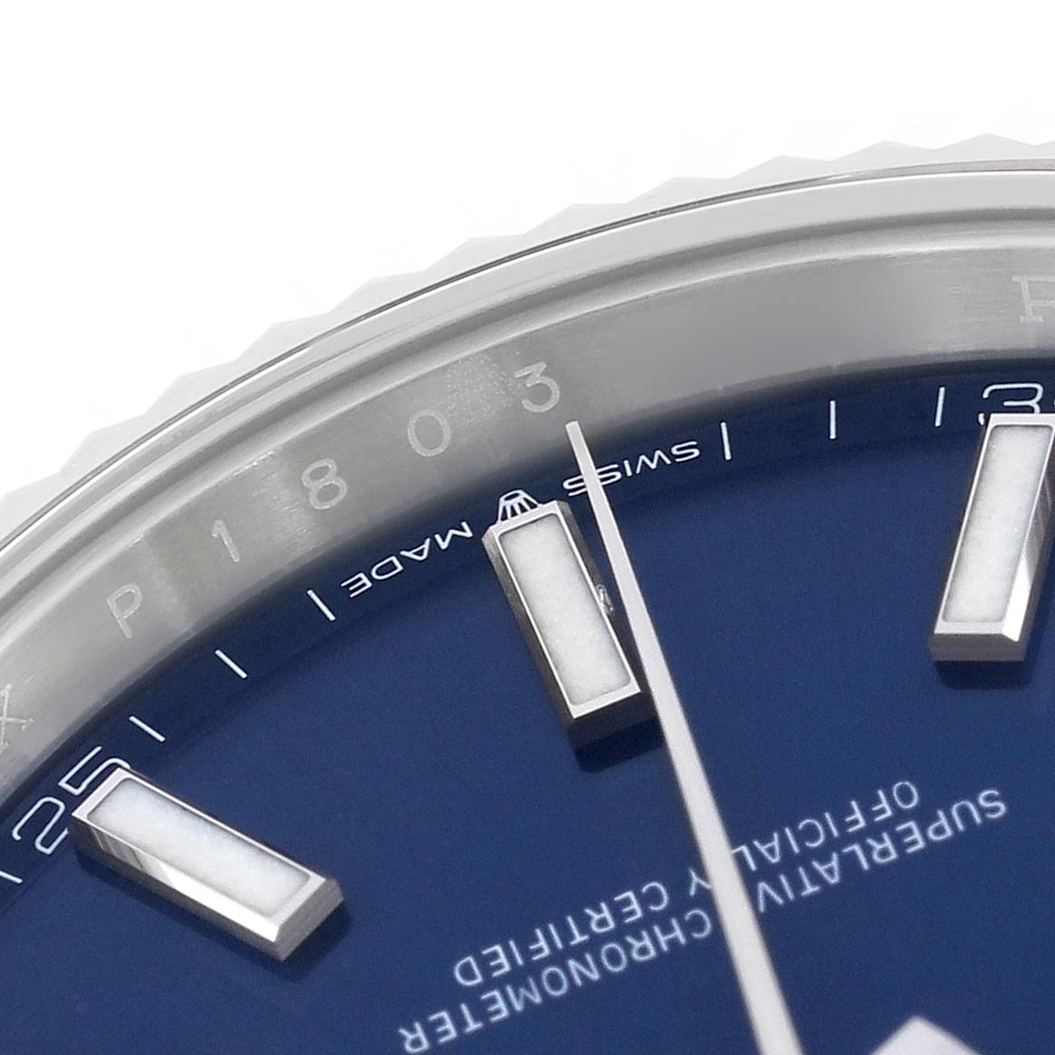 The image shows a close-up of the blue dial and hour markers of a Rolex Datejust 41 126334 Men
s Stainless Steel Blue Dial 126334 Men
s Stainless Steel Blue Dial, highlighting the "Swiss Made" text.