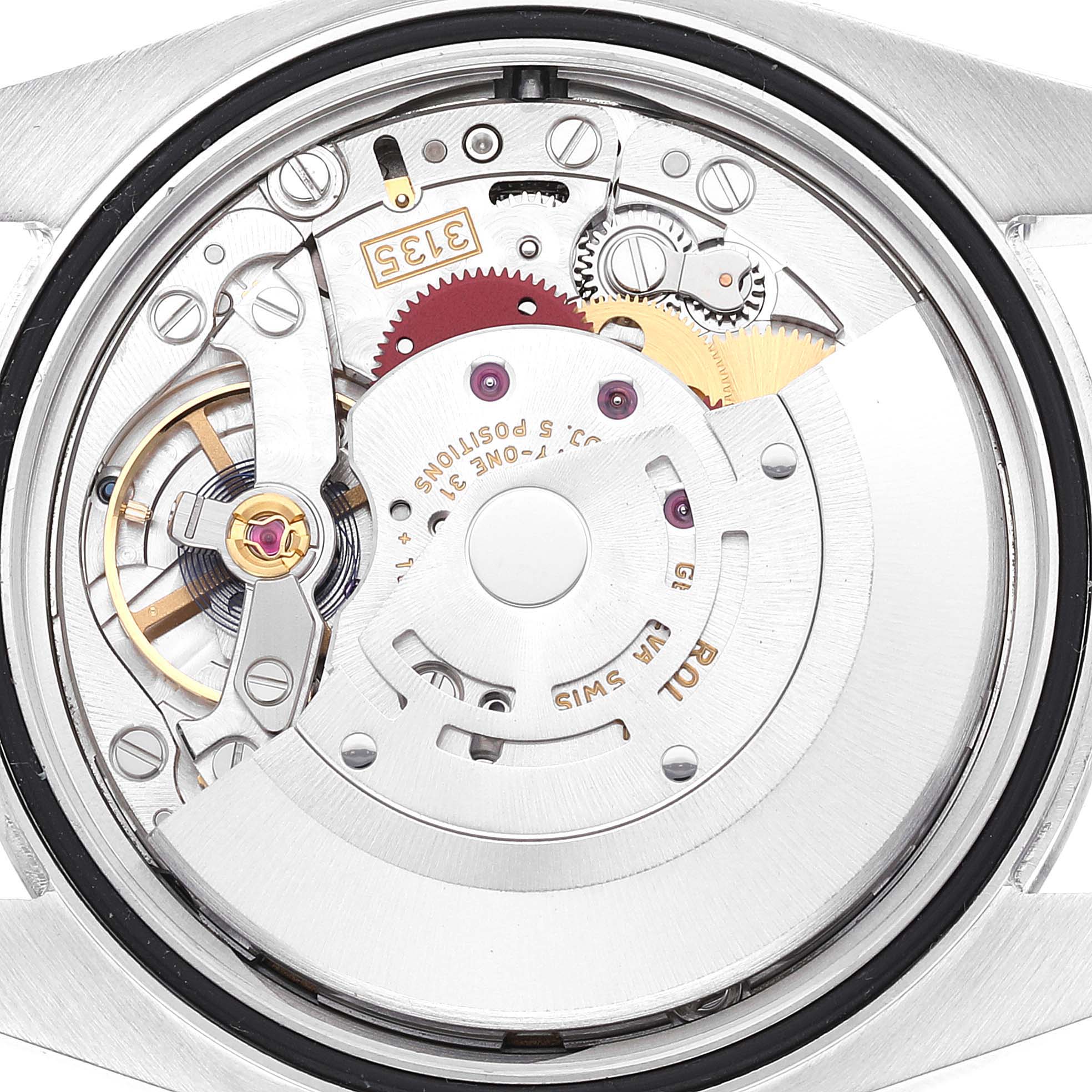 This image shows the internal mechanism and components of a Rolex Datejust 116200 Men's Stainless Steel Black Dial 116200 Men's Stainless Steel Black Dial watch, viewed from the back.