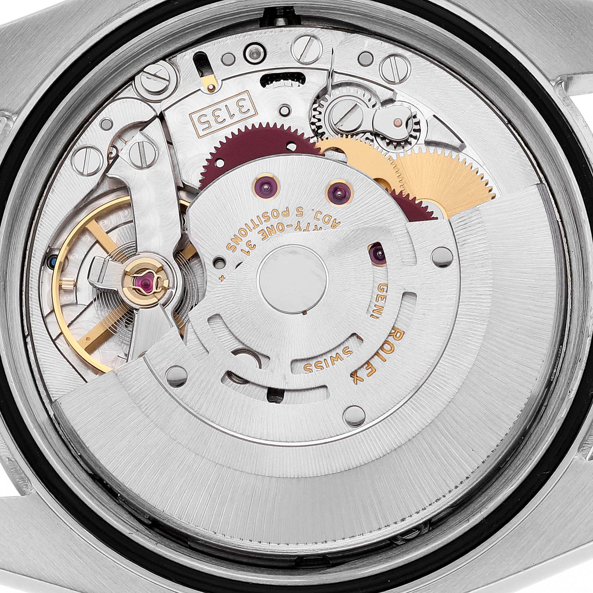 The image shows a close-up view of the movement and inner mechanism of a Rolex Datejust 116200 Men's Stainless Steel Black Dial 116200 Men's Stainless Steel Black Dial watch.