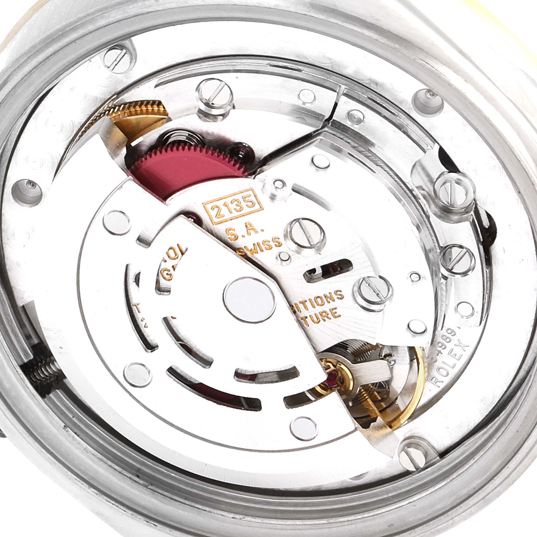 The image shows the inner mechanical movement of a Rolex Mid-Size 68273 Women
s Steel and Gold (two tone) White Dial 68273 Women
s Steel and Gold (two tone) White Dial watch, viewed from the back.
