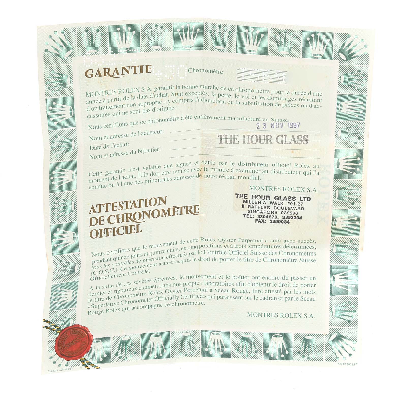 The image shows a warranty certificate for a Mid-Size Rolex watch, featuring verification and dealer details.