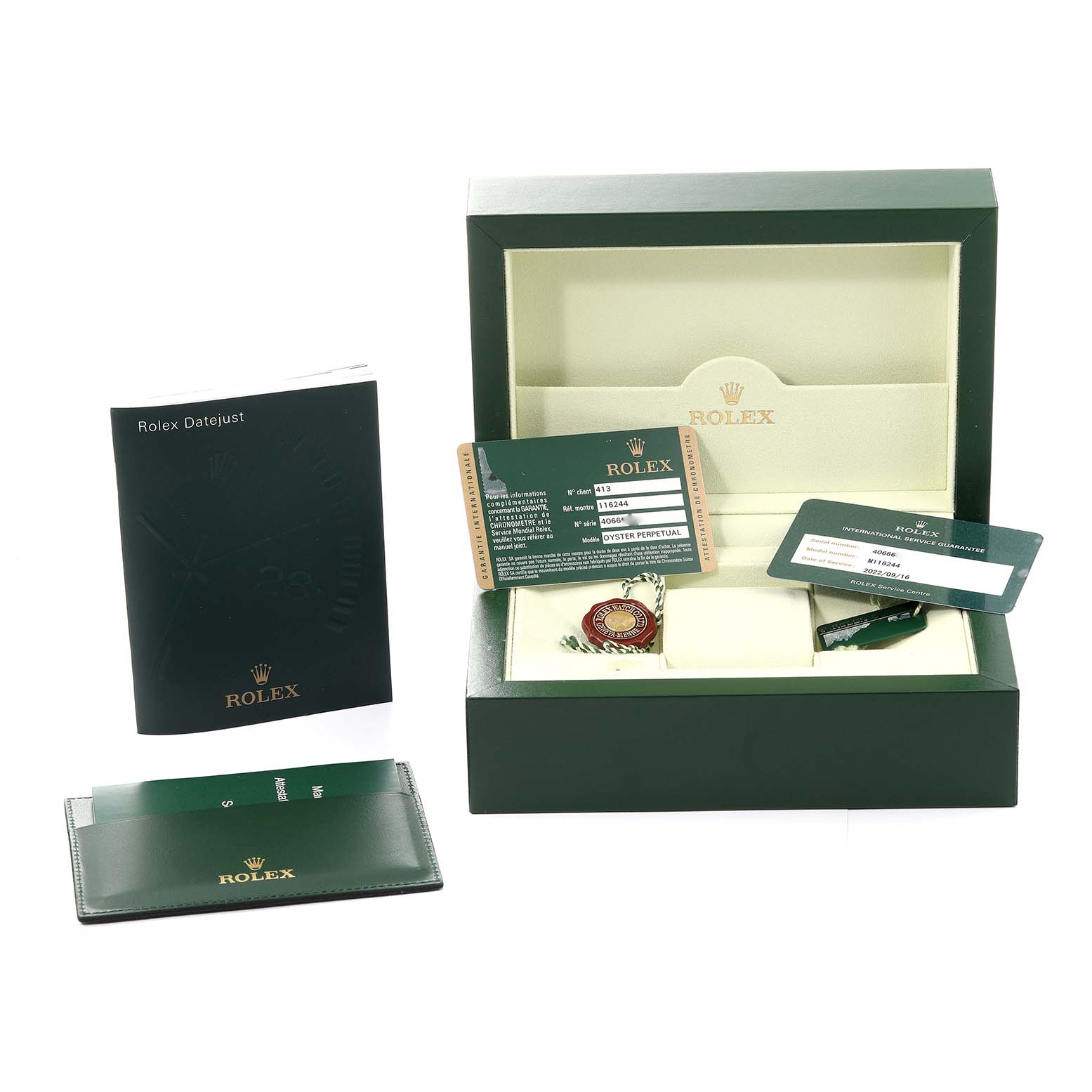 The image shows a Rolex Datejust 116244 Men's Stainless Steel Mother of Pearl Dial 116244 Men's Stainless Steel Mother of Pearl Dial watch box, manual, warranty card, and accessories from a front angle.