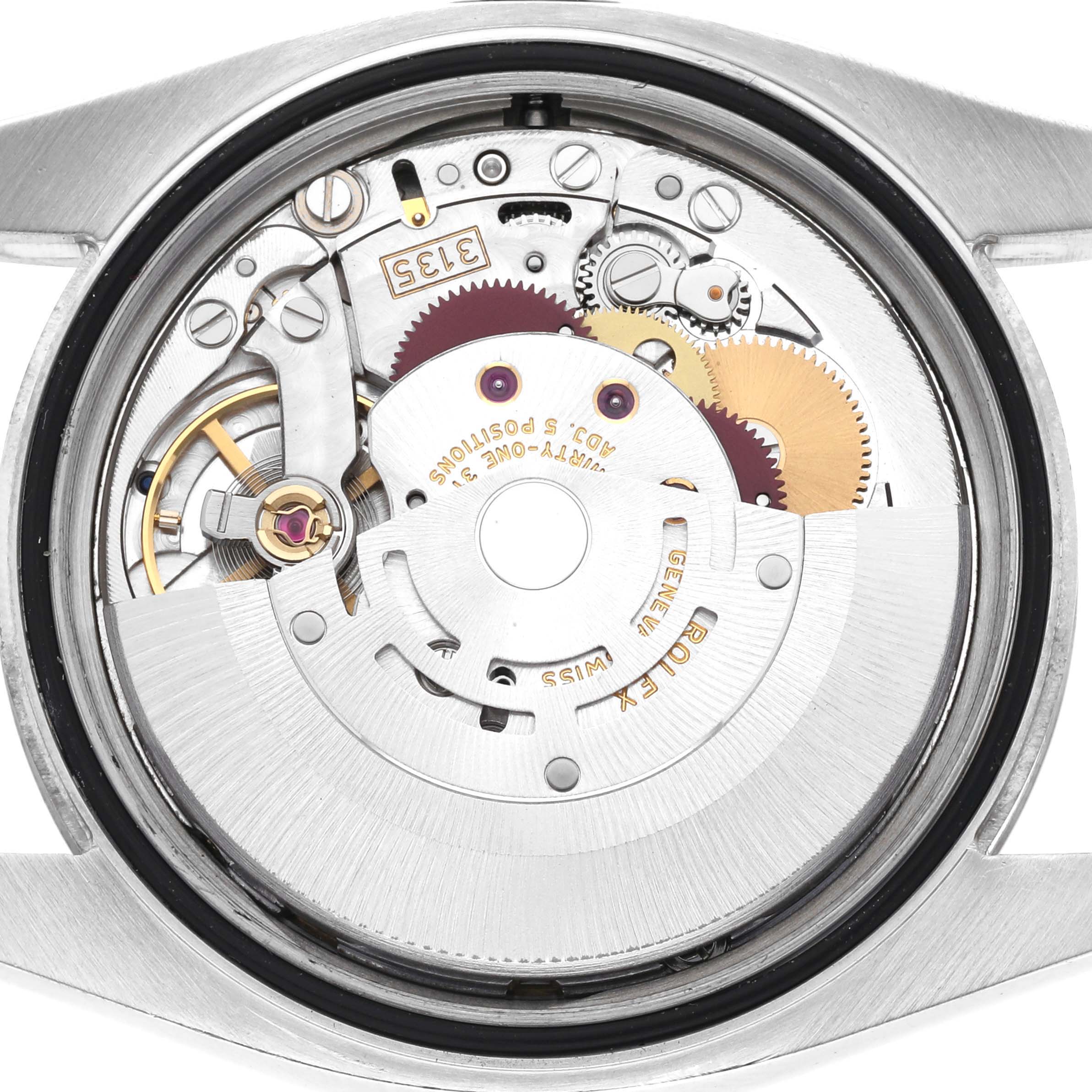This image shows the internal mechanism of the Rolex Datejust 116234 Men
s Stainless Steel Blue Dial 116234 Men
s Stainless Steel Blue Dial watch from the back case angle, highlighting its intricate parts.