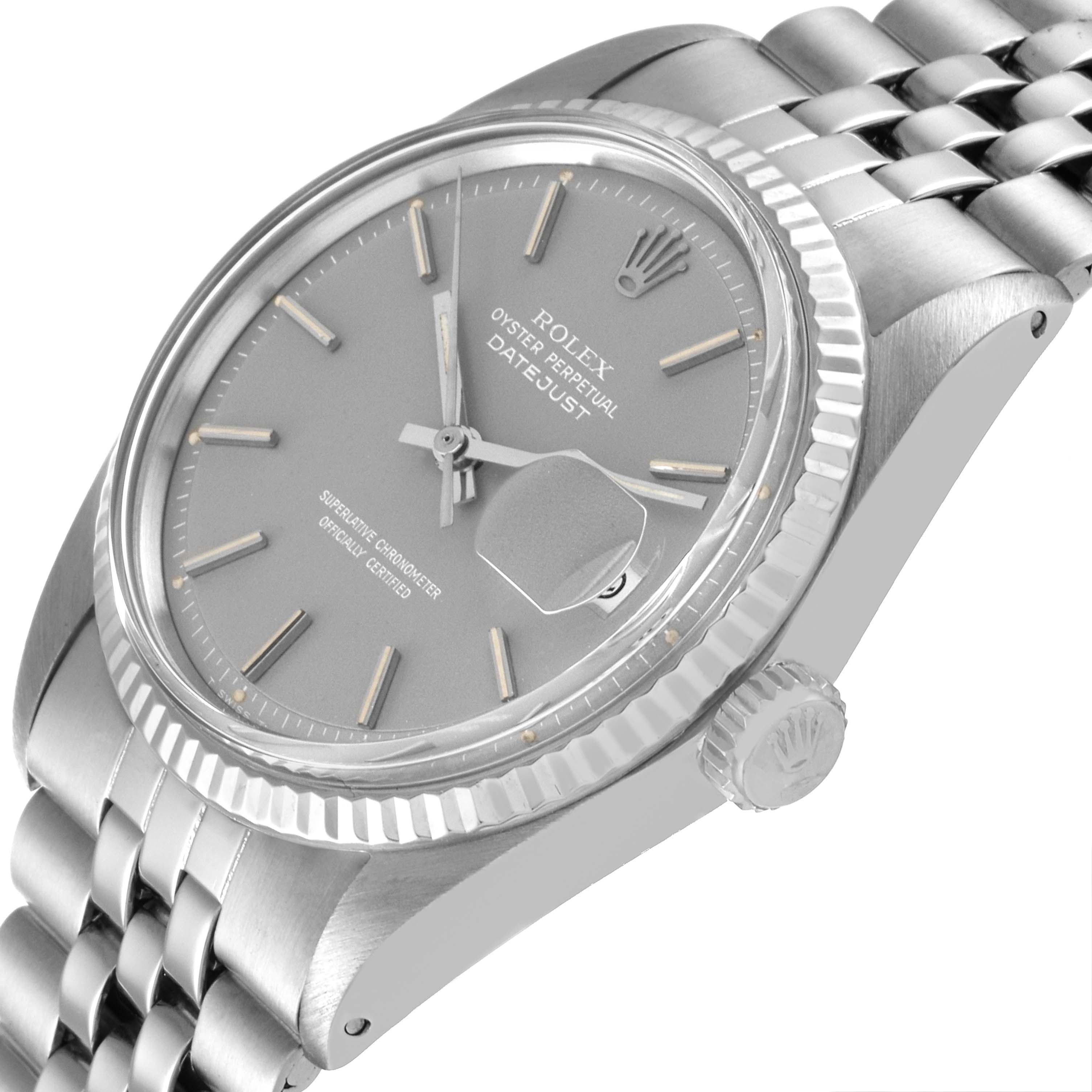 The image shows a top angled view of the Rolex Vintage Collection 1601 Men
s Stainless Steel Grey Dial 1601 Men
s Stainless Steel Grey Dial Datejust watch, featuring the dial, bezel, crown, and part of the bracelet.