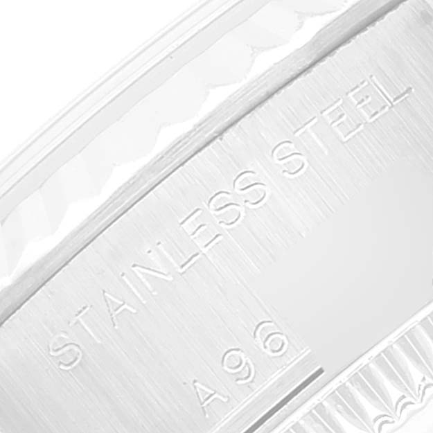 This image shows a close-up of the stainless steel casing of a Rolex Datejust 79174 Women's Stainless Steel White Dial 79174 Women's Stainless Steel White Dial watch, highlighting the "Stainless Steel" engraving.