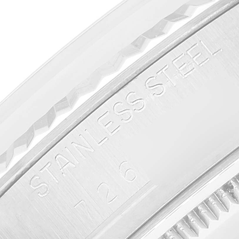 This image shows a close-up of the stainless steel engravings on the bezel of a Rolex Datejust 16014 Men
s Stainless Steel Silver Dial 16014 Men
s Stainless Steel Silver Dial watch.
