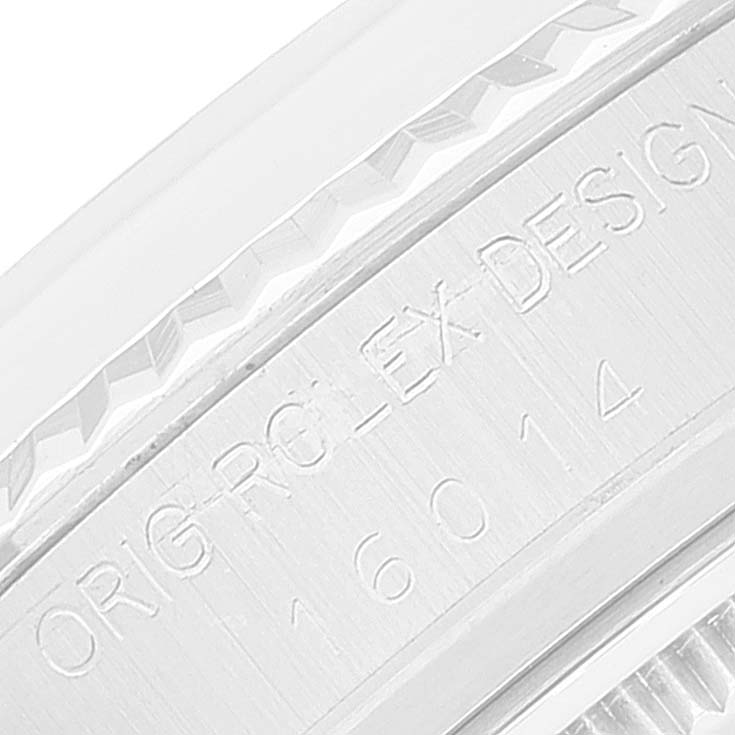 The image shows a close-up of the inner bezel of a Rolex Datejust 16014 Men
s Stainless Steel Silver Dial 16014 Men
s Stainless Steel Silver Dial, featuring the model number and "Orig Rolex Design" engraving.