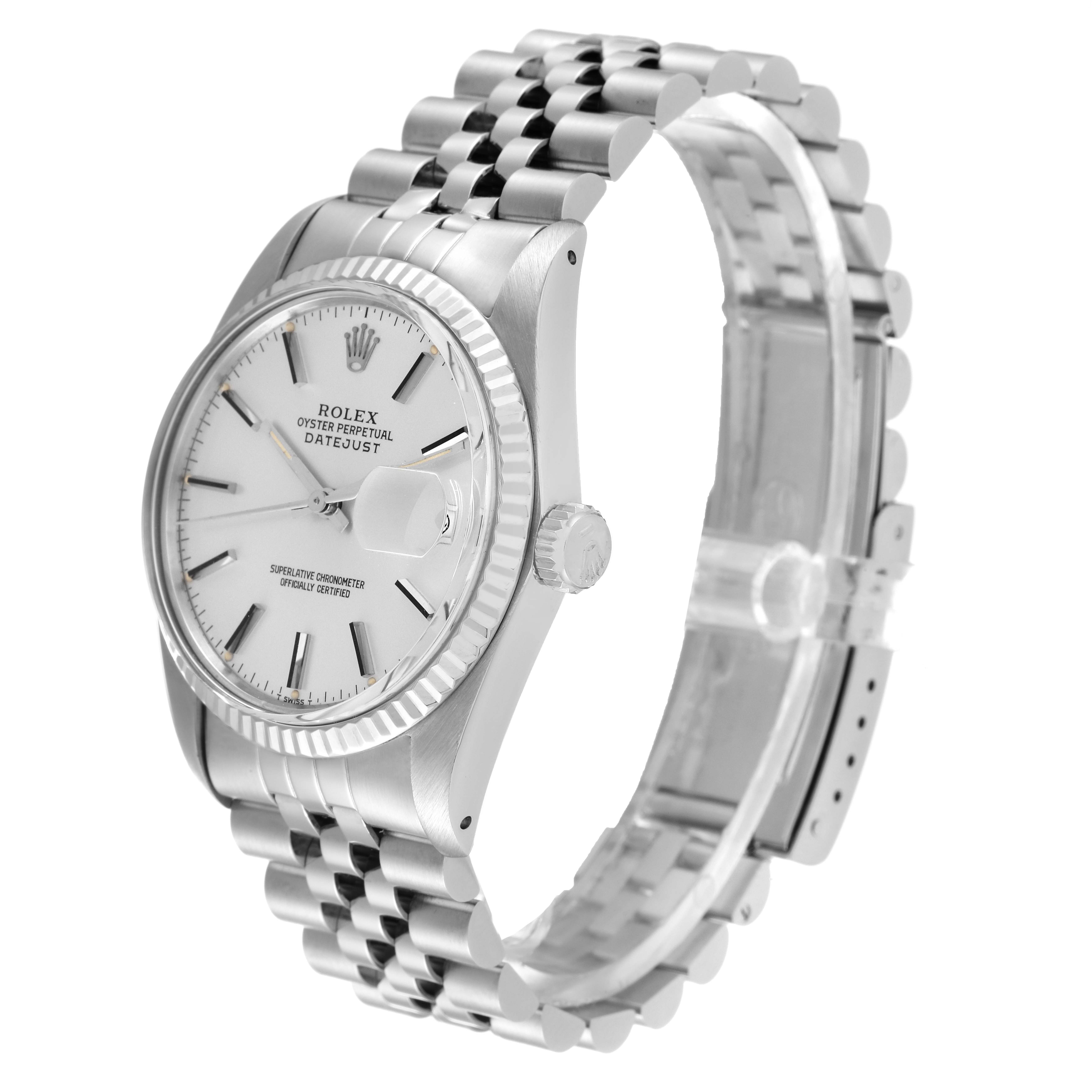 The Rolex Datejust 16014 Men
s Stainless Steel Silver Dial 16014 Men
s Stainless Steel Silver Dial watch is shown at a three-quarter angle, highlighting the face, crown, and bracelet.