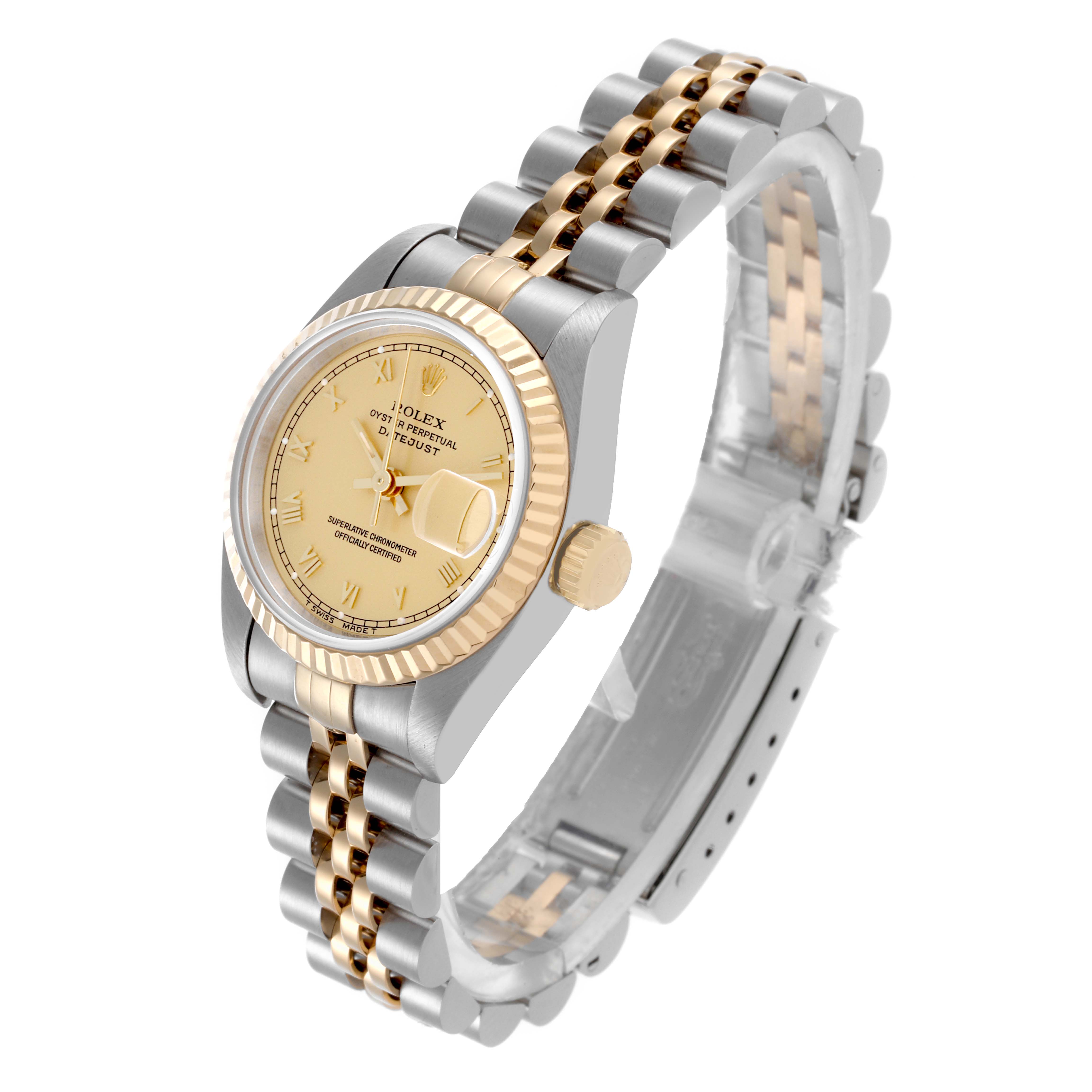 The Rolex Datejust 69173G Women's Steel and Gold (two tone) Champagne Dial 69173G Women's Steel and Gold (two tone) Champagne Dial watch is shown at a three-quarter angle, displaying the dial, bezel, crown, and Jubilee bracelet.
