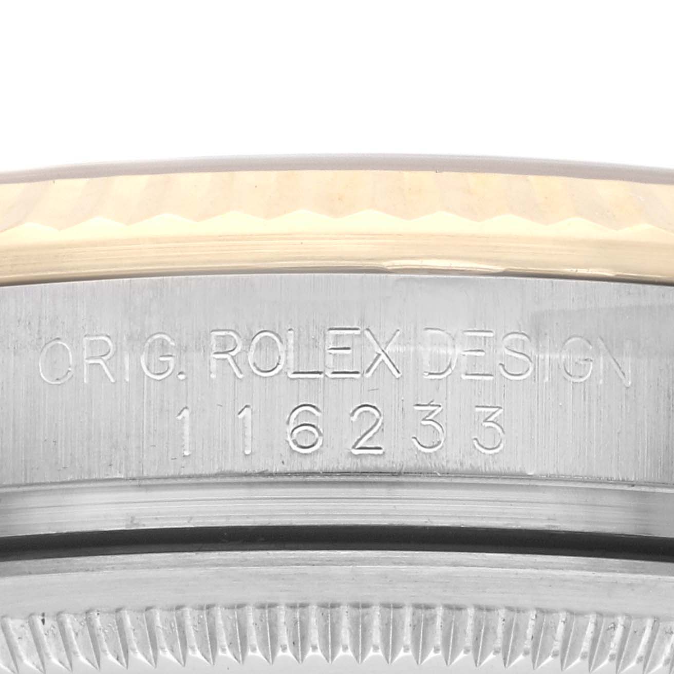 The image shows a close-up of a Rolex Datejust 116233 Men
s Steel and Gold (two tone) Champagne Dial 116233 Men
s Steel and Gold (two tone) Champagne Dial case side, displaying the model and design numbers.